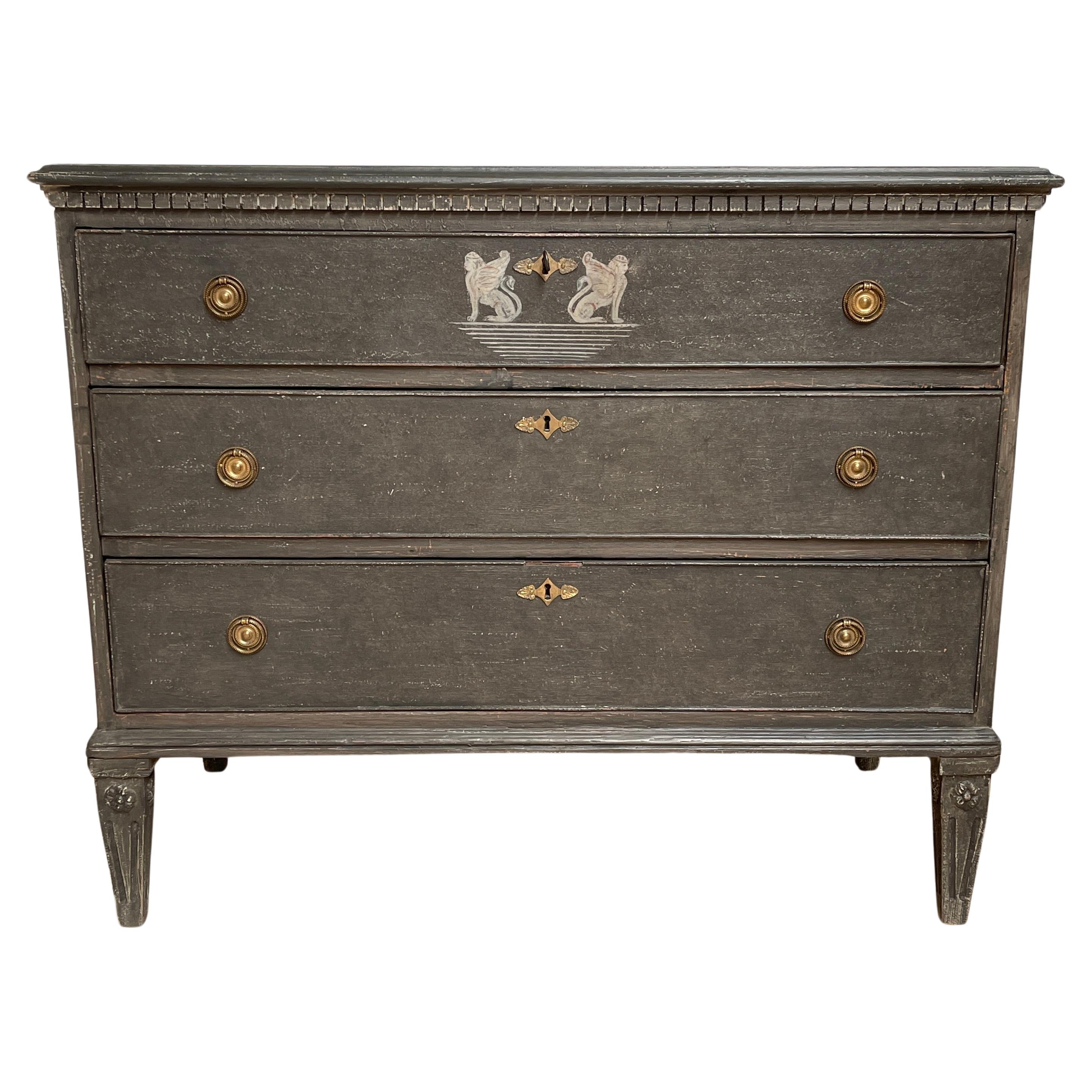 Gustavian Painted Commode Chest of Drawers, Sweden

Hand painted Gustavian style chest of drawers constructed from solid wood with a hand-applied distressed finish with brass ring hardware. Wonderful details including dental molding below the solid
