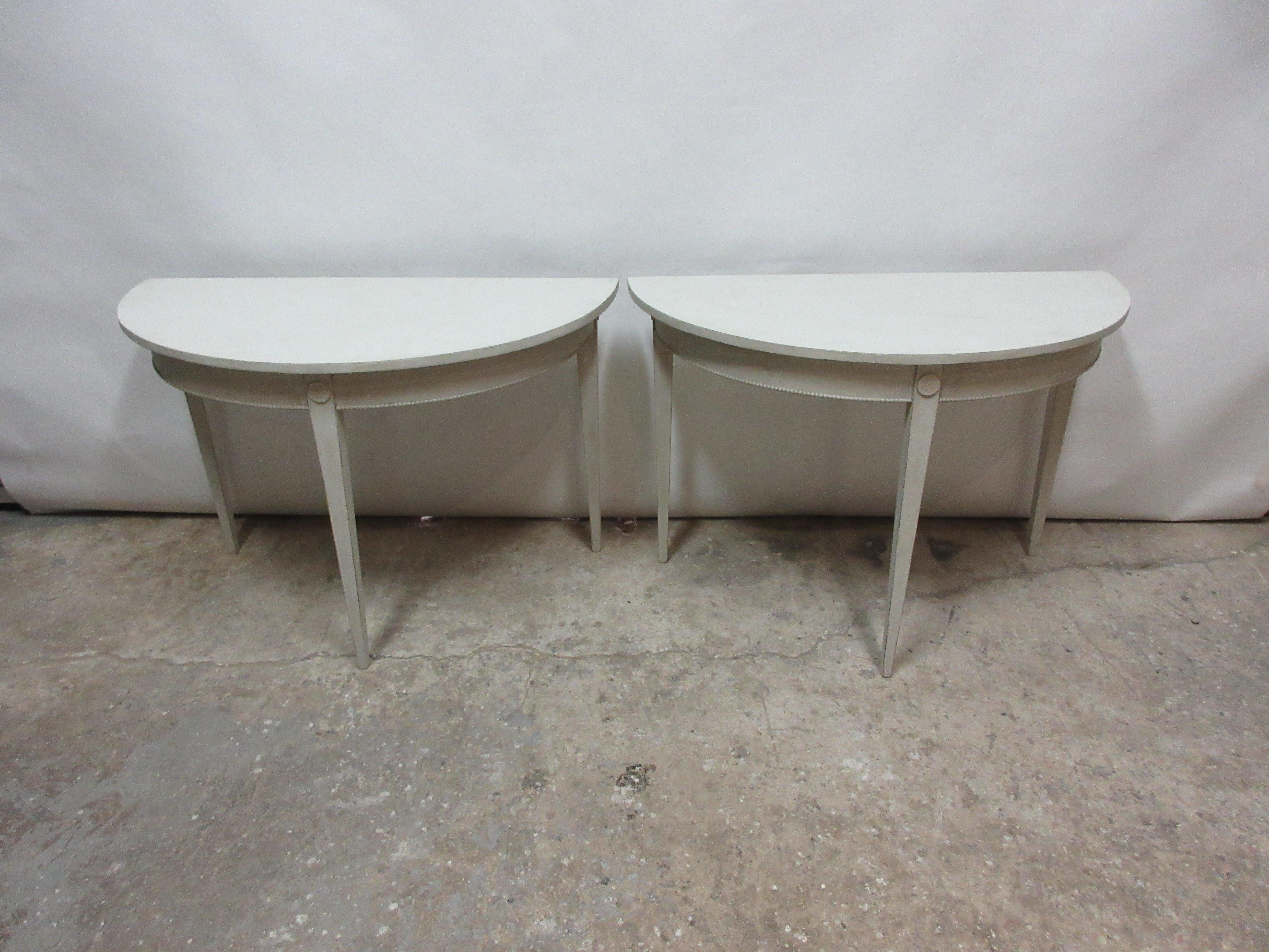 This is a set of 2 Swedish Gustavian demilune tables, they have been restored and repainted with milk paints 