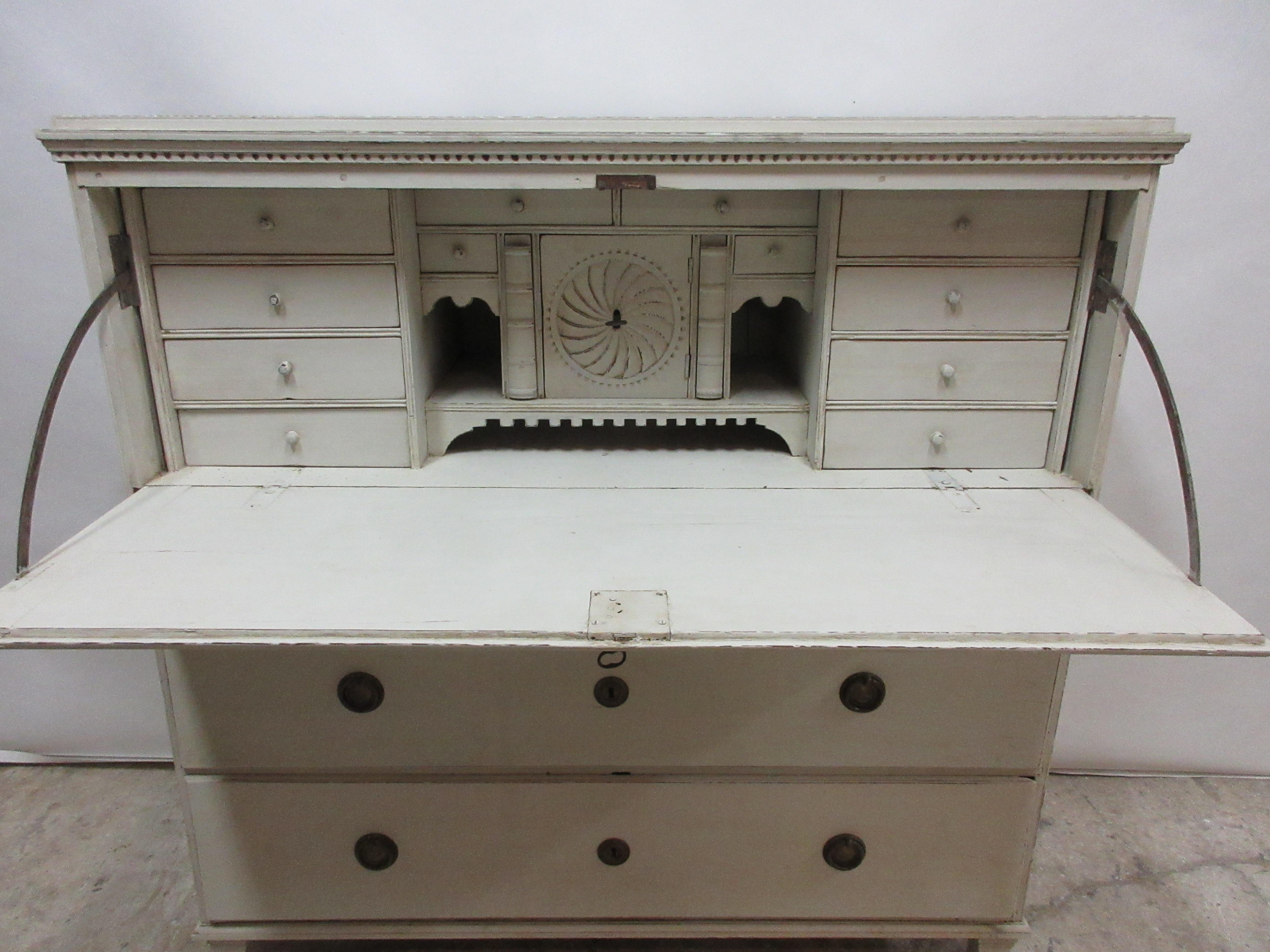 This is a Swedish Gustavian drop front desk. Its been restored and repainted with milk paints, 