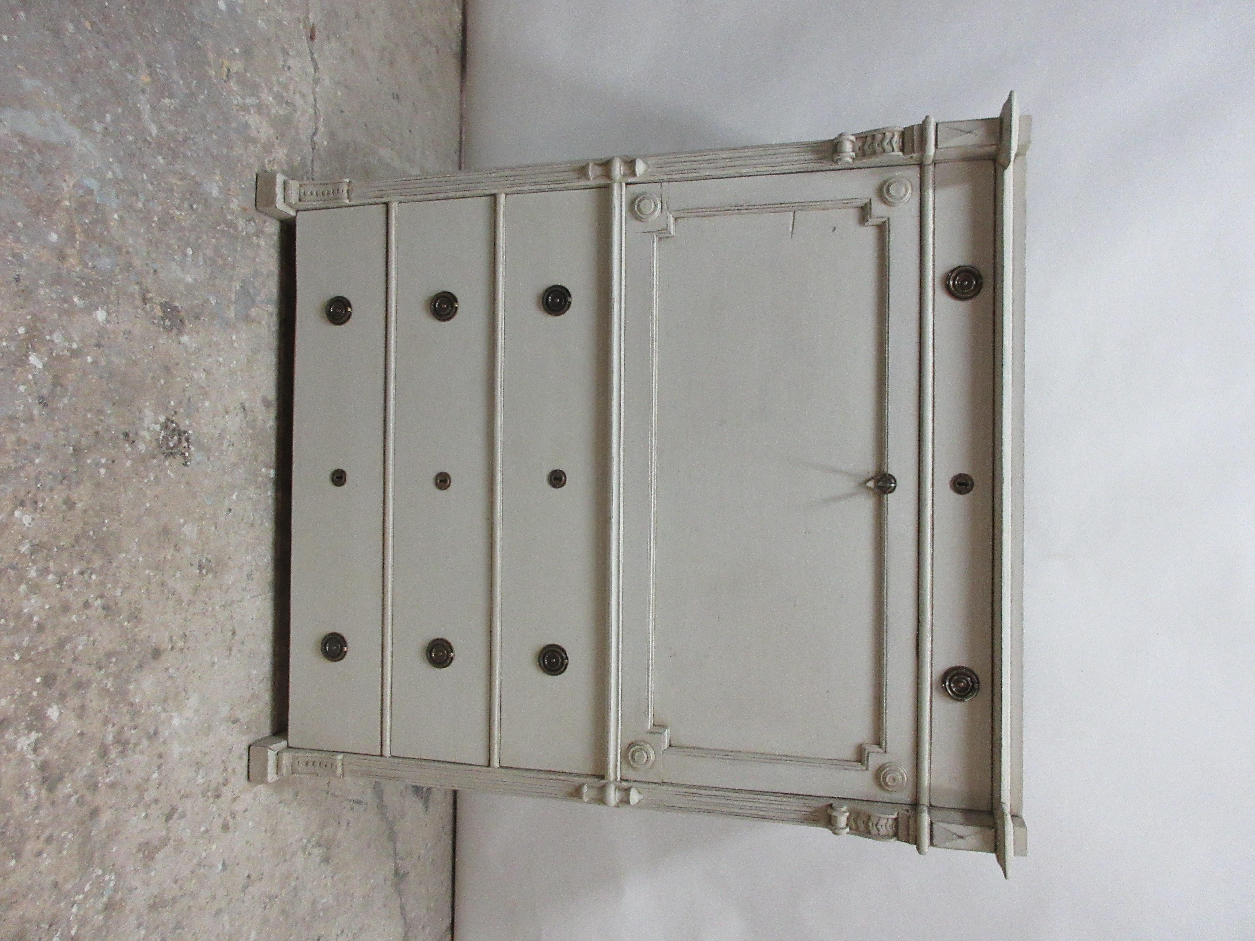This is a Swedish Gustavian drop frount desk. Its been restored and repainted with milk paints 
