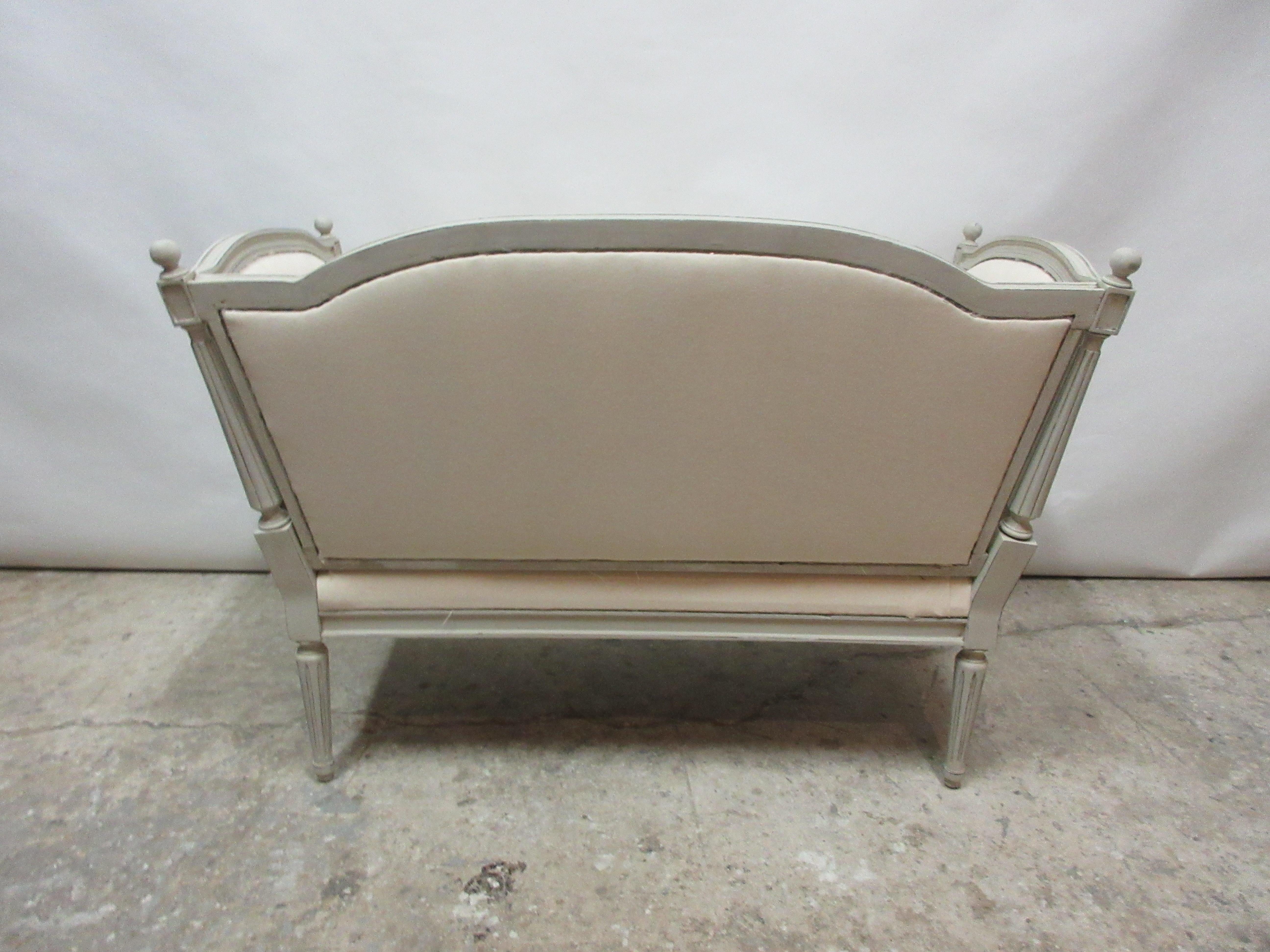 This is a Swedish Gustavian loveseat sofa. it has been restored and repainted with milk paints 