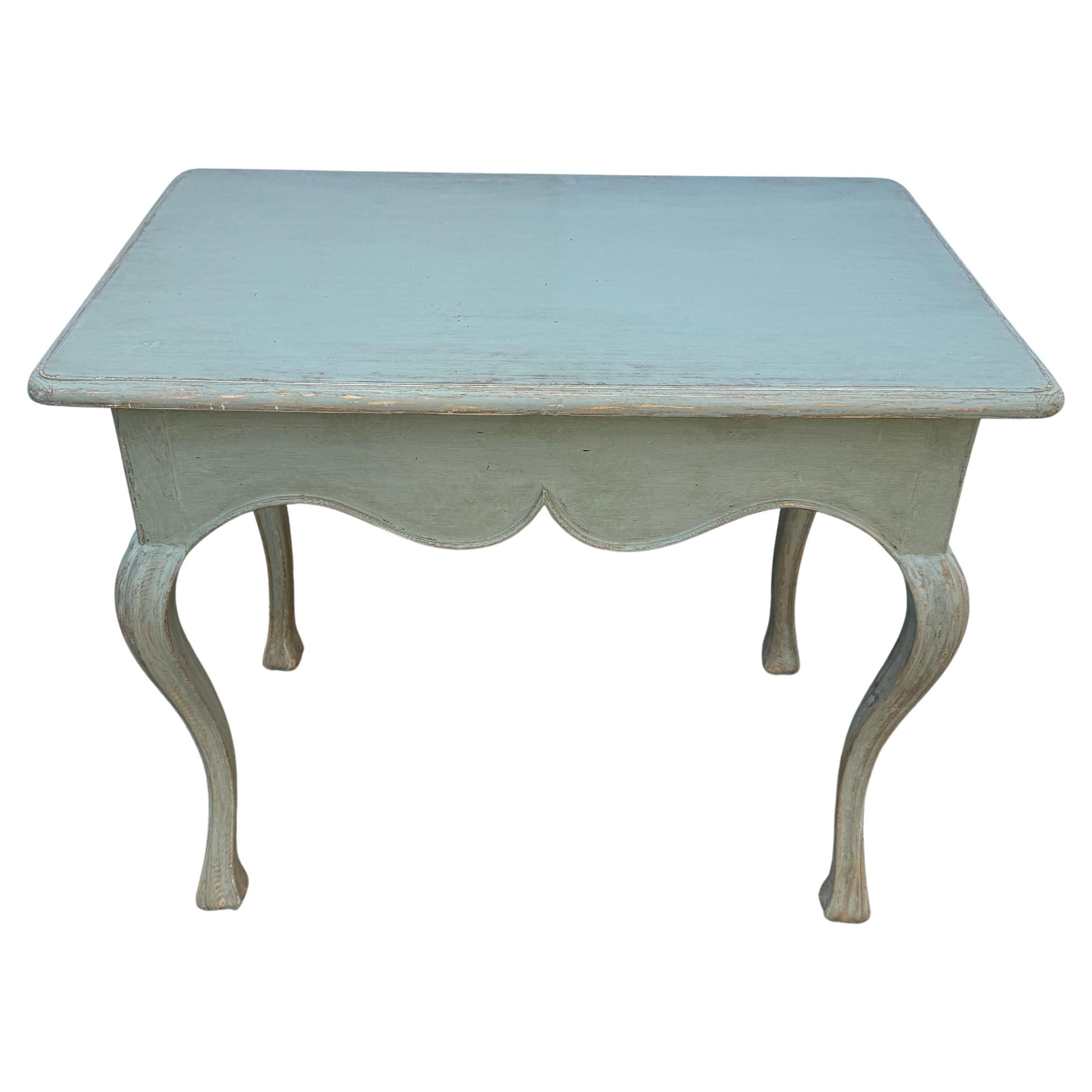 Hand Painted Hall, End or Occasional Table, Swedish Gustavian

Hand painted and hand distressed wood side table with cabriole legs in a muted Scandinavian green color. The clean lines and elegance of this piece of Gustavian furniture is equally at