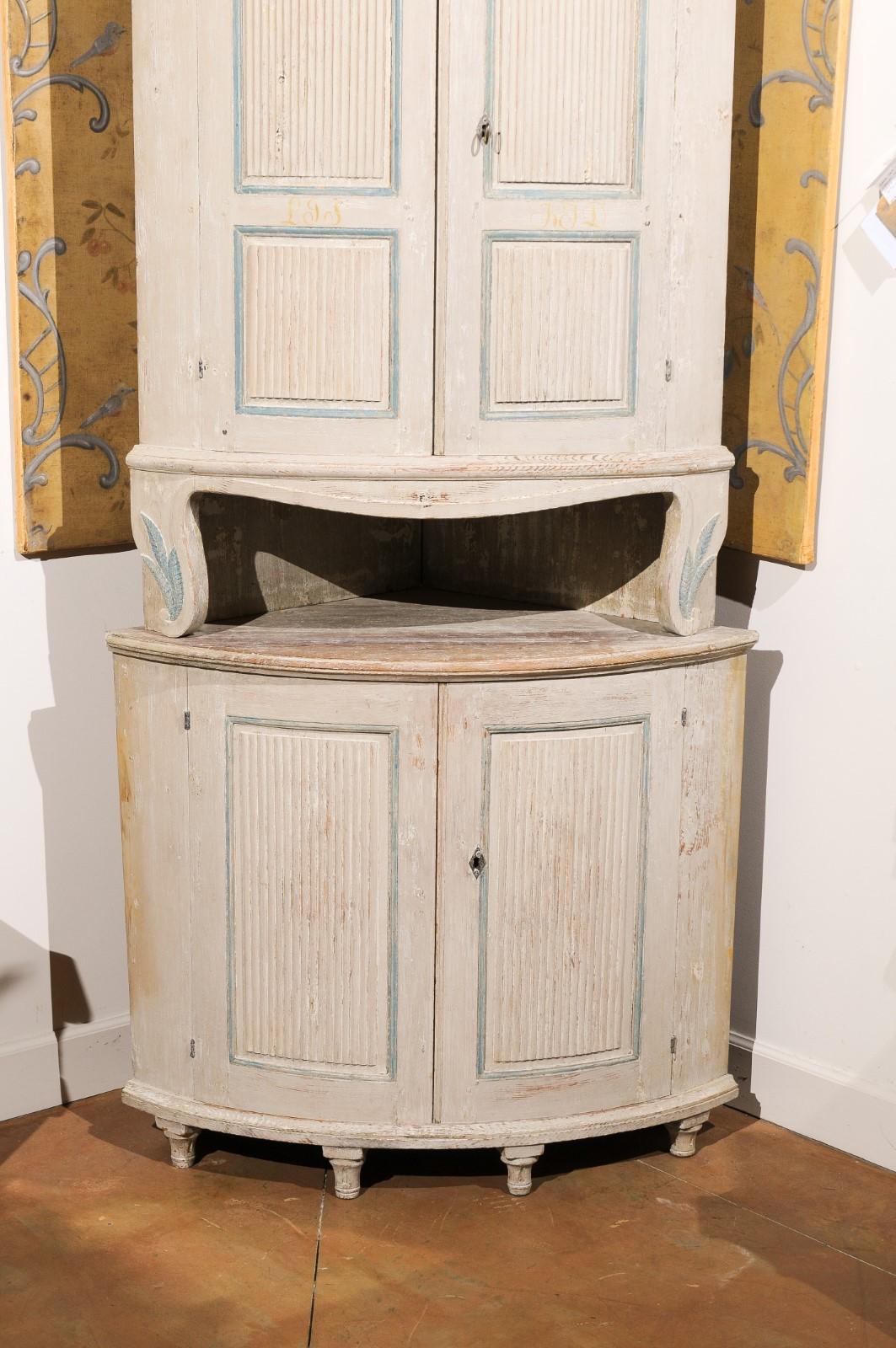 Wood Swedish Gustavian Period 1800s Painted Corner Cabinet with Carved Foliage