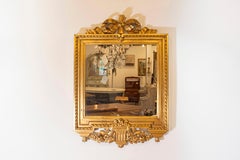 Swedish Gustavian Period Giltwood Mirror, circa 1780 with Ribbon-Carved Crest