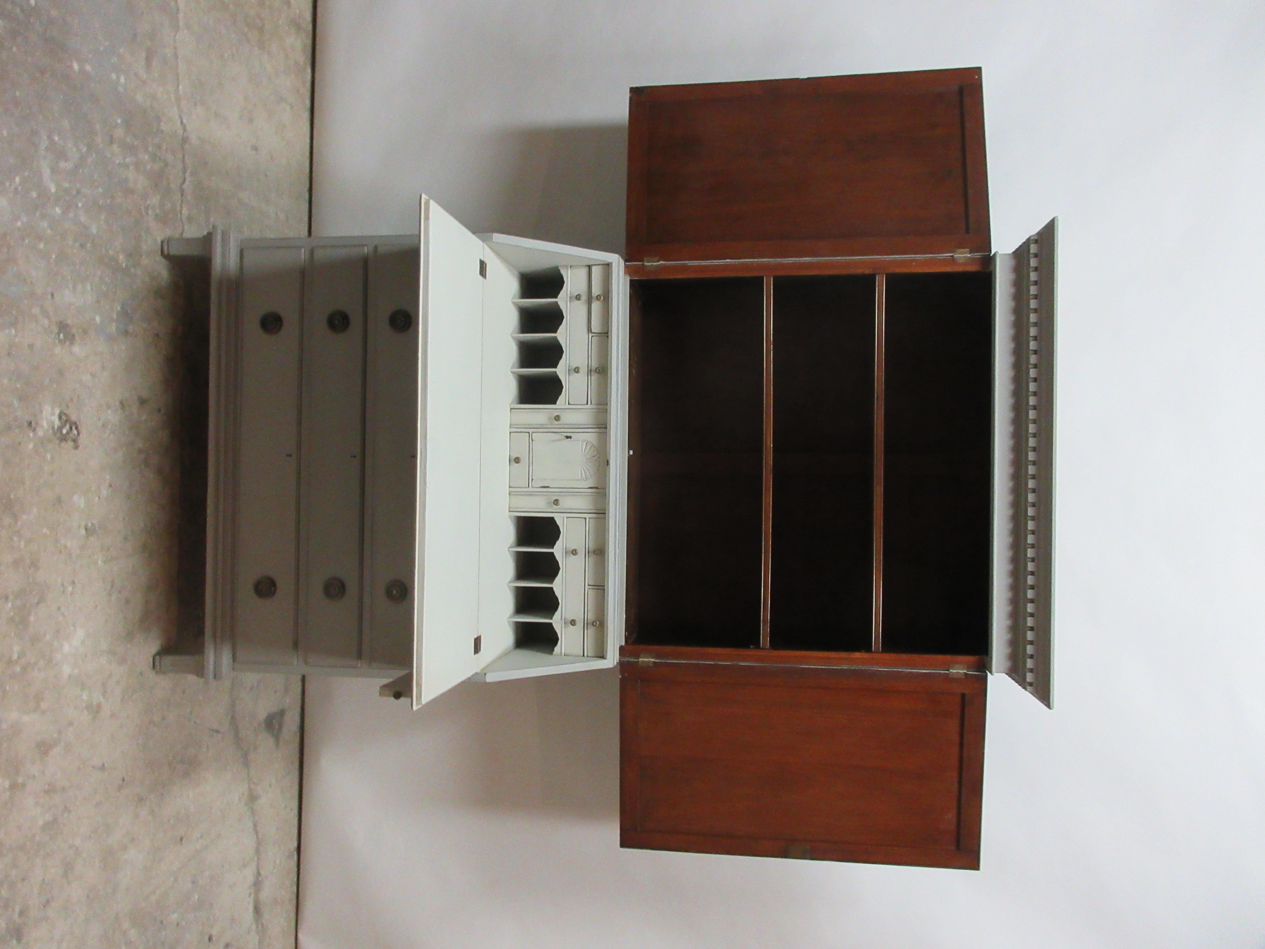 This is a Swedish Gustavian secretary hutch. It has been restored and repainted with 