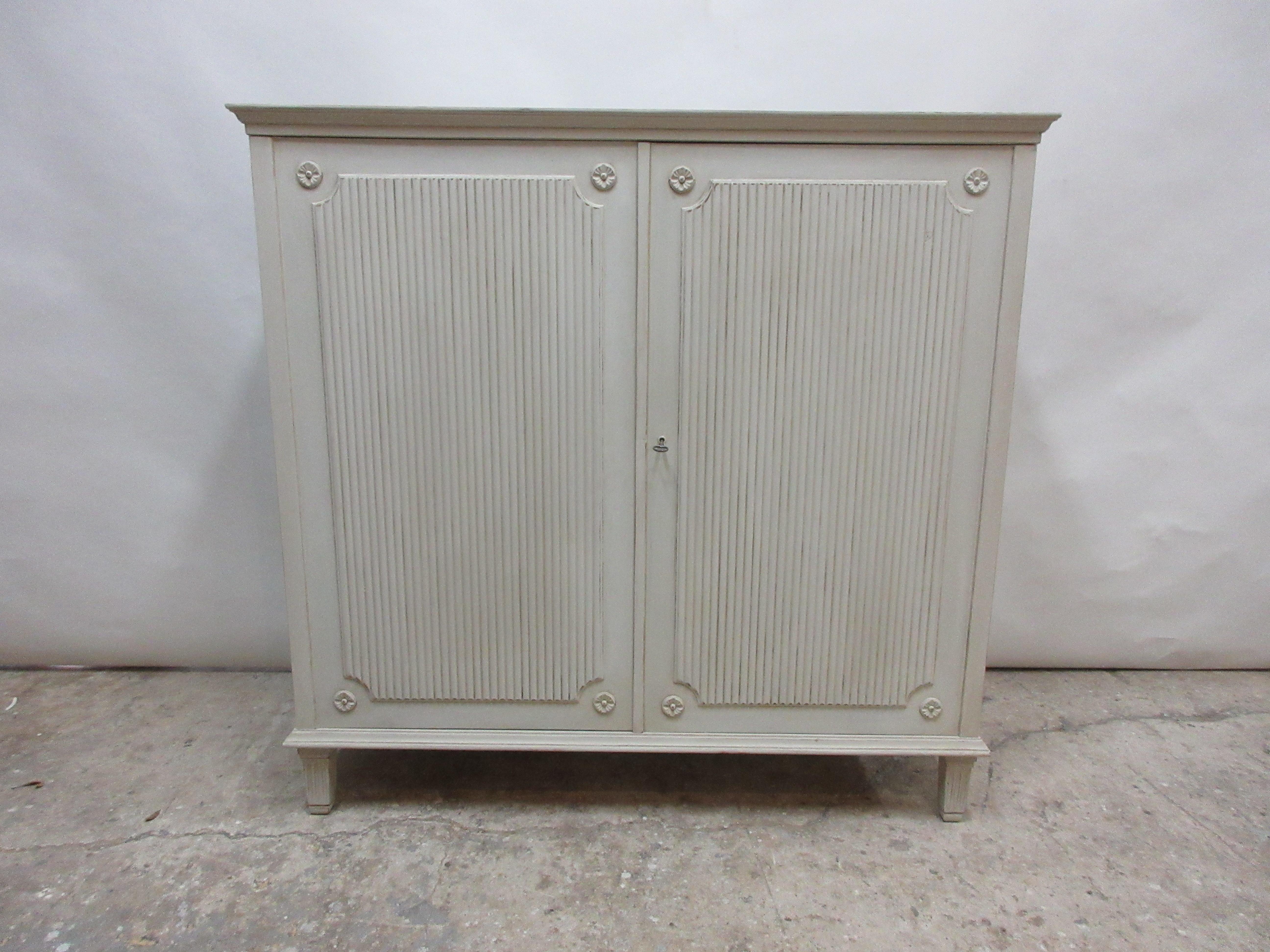 This is a 2 door Swedish Gustavian sideboard, its been restored and repainted with Milk Paints 