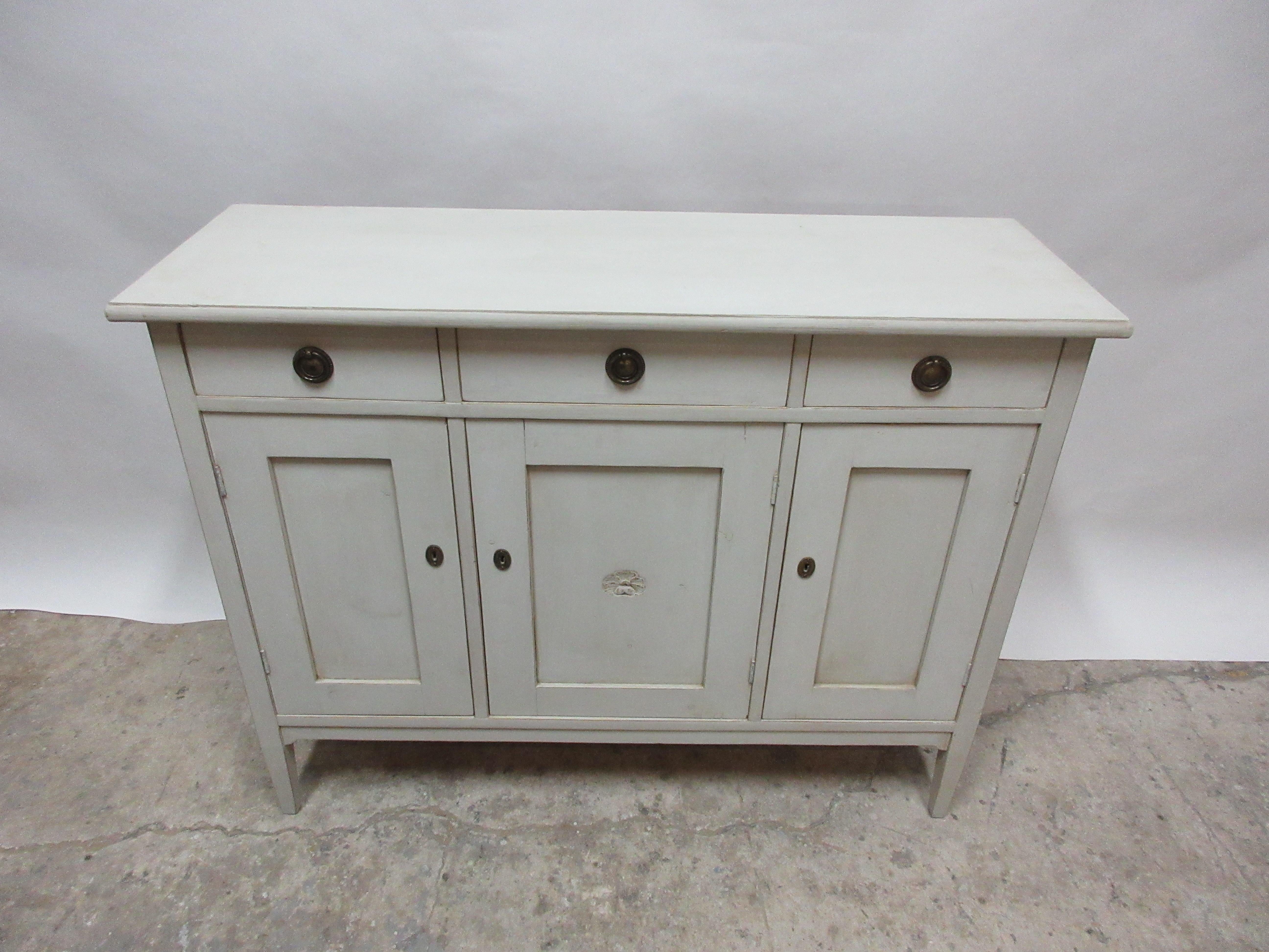 This is a Swedish Gustavian sideboard, its been restored and repainted with milk paints 