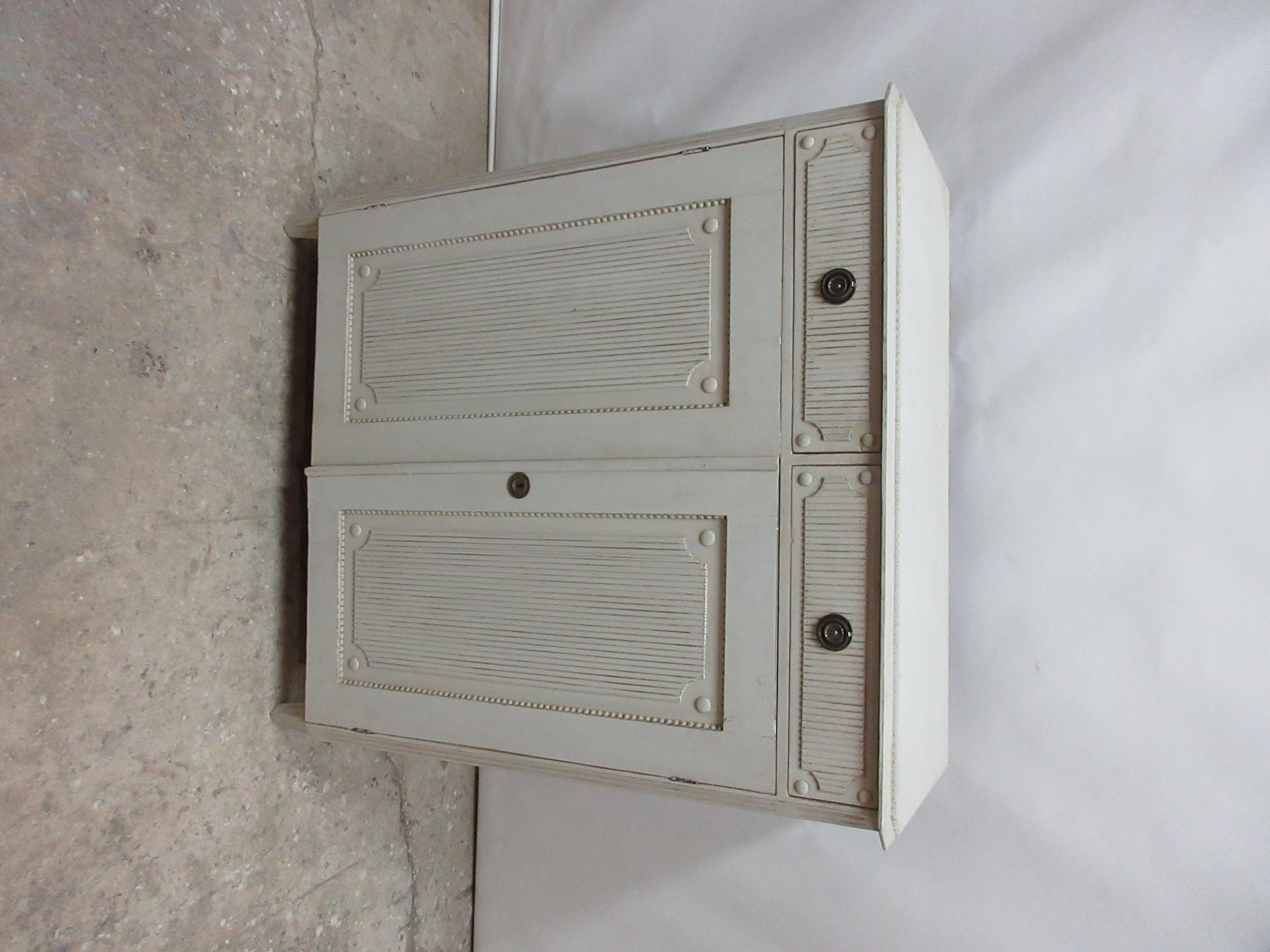 This is a Swedish Gustavian sideboard, its been restored and repainted with milk paints 