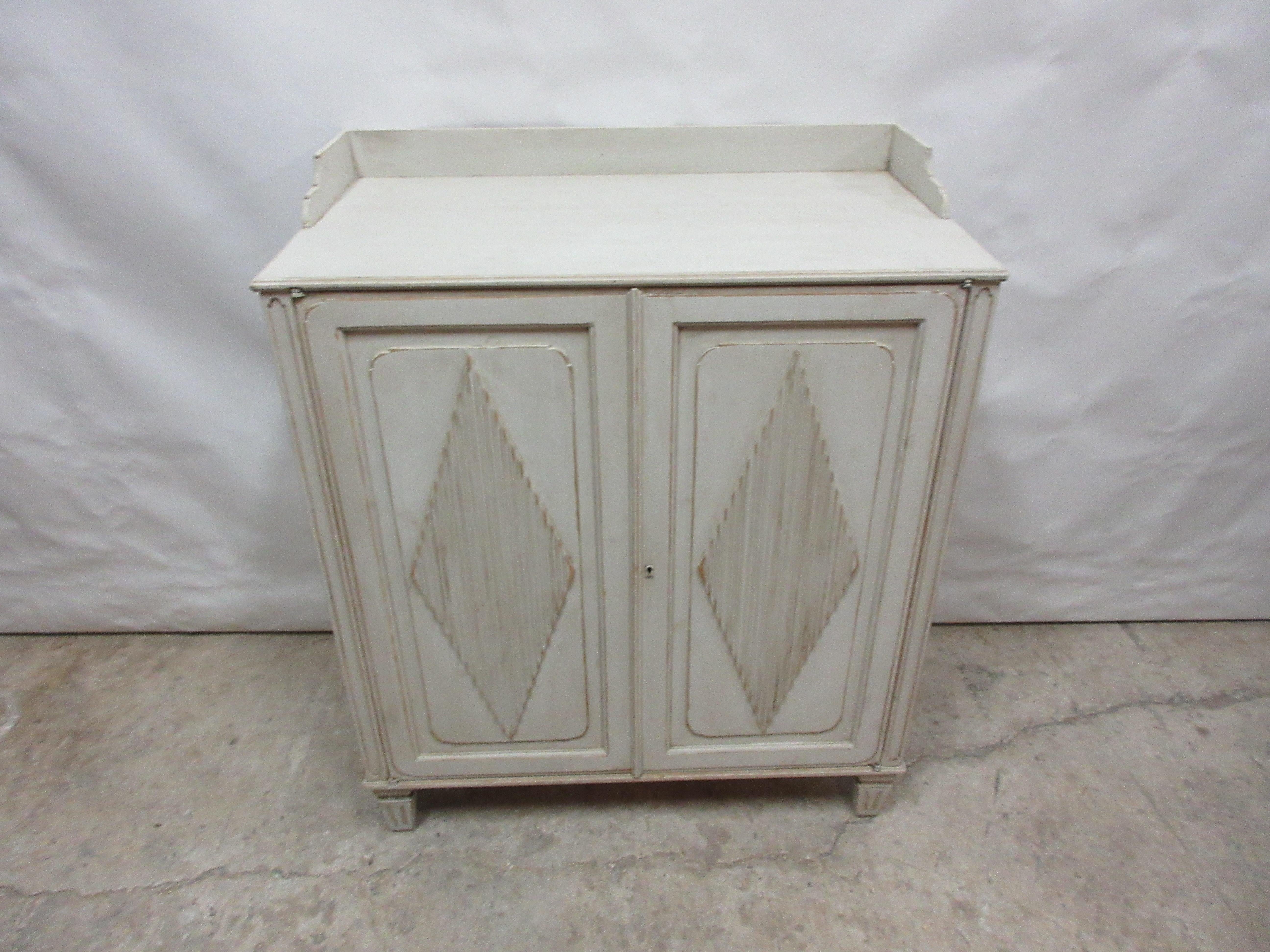 This Swedish Gustavian sideboard was found at an auction in Goteborg, Sweden. Its been restored and repainted with milk paints 