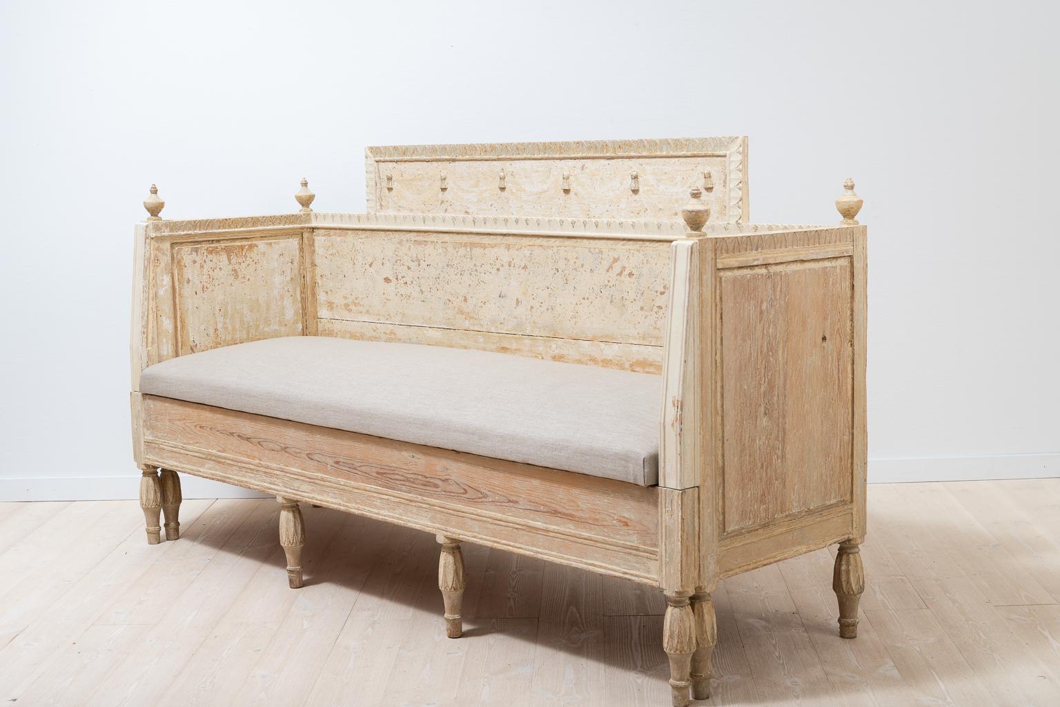 Gustavian sofa from northern Sweden that’s been dry scraped to original paint. Renovated seat with upholstery in linen fabric, Västerbotten, circa 1790-1800

 The Gustavian style has received its name from the Swedish king Gustav III that ruled