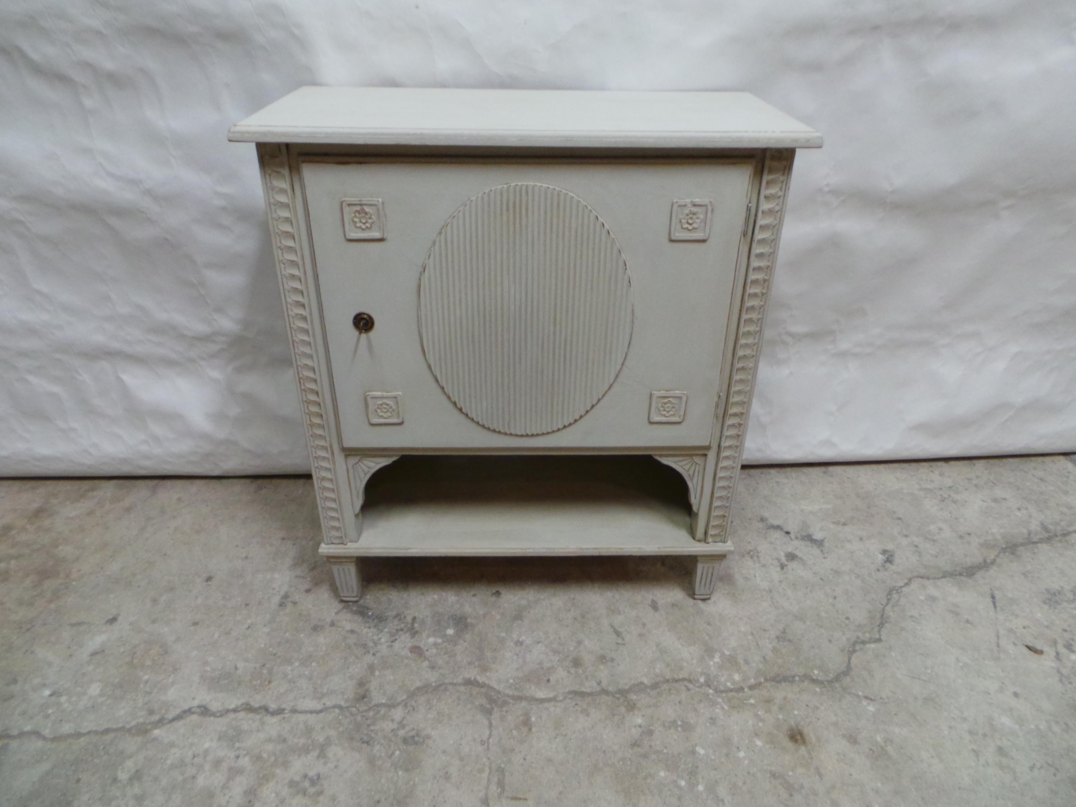 This is a Swedish Gustavian Style 1 Door Cabinet. its been restored and repainted with Milk Paints 