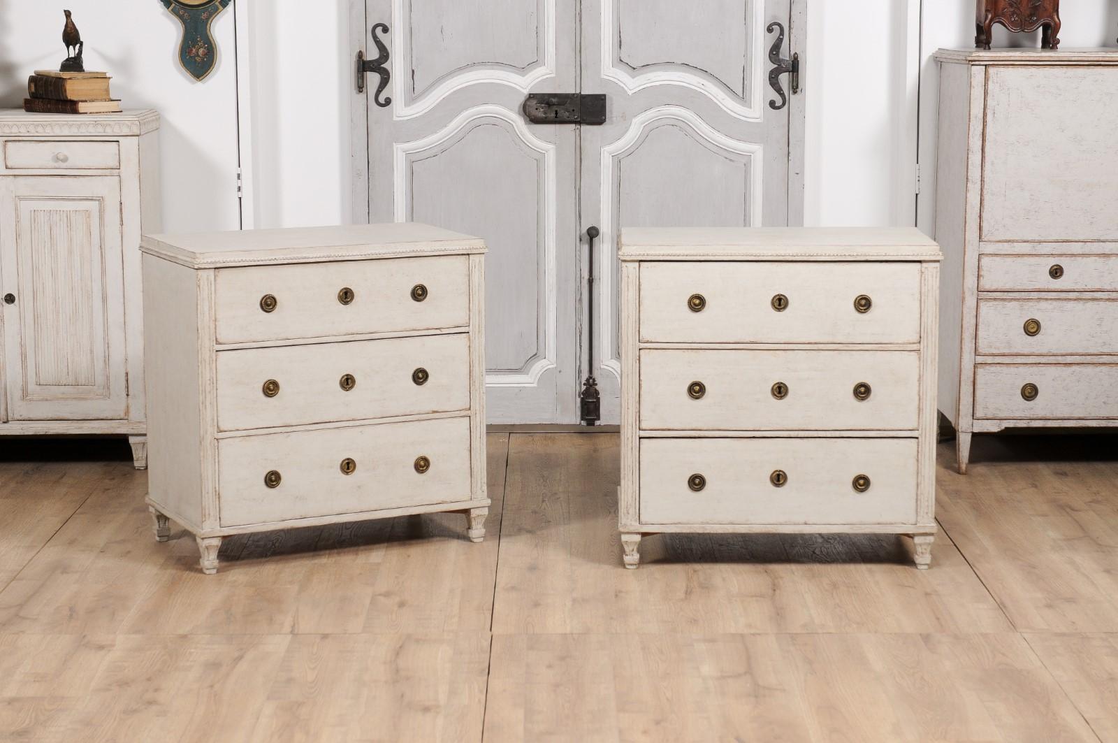 Carved Swedish Gustavian Style 1880s Gray Beige Painted Three-Drawer Chests, a Pair