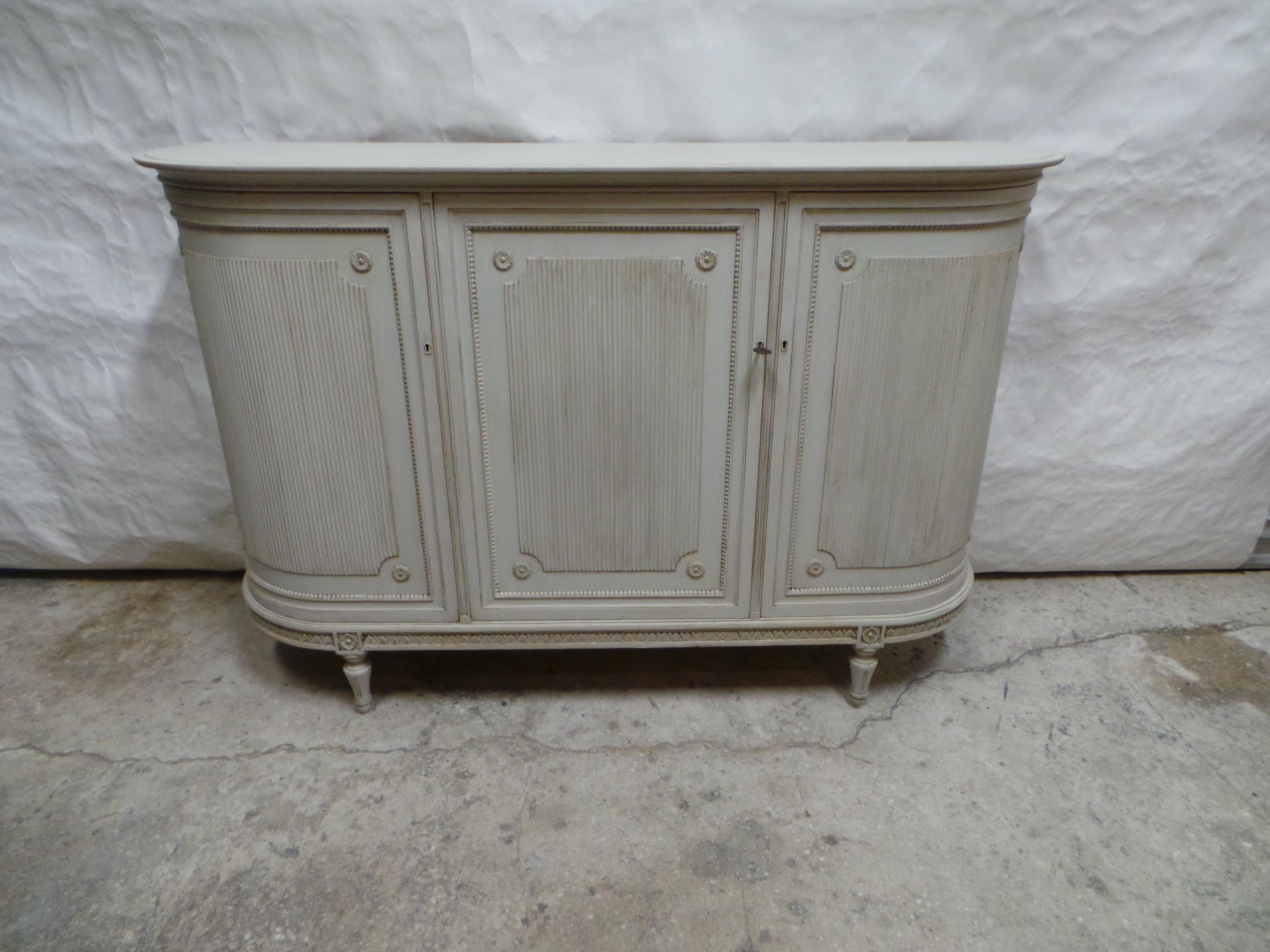 This is a unique Swedish Gustavian Style 3 door sideboard. its been restored and repainted with Milk Paints 