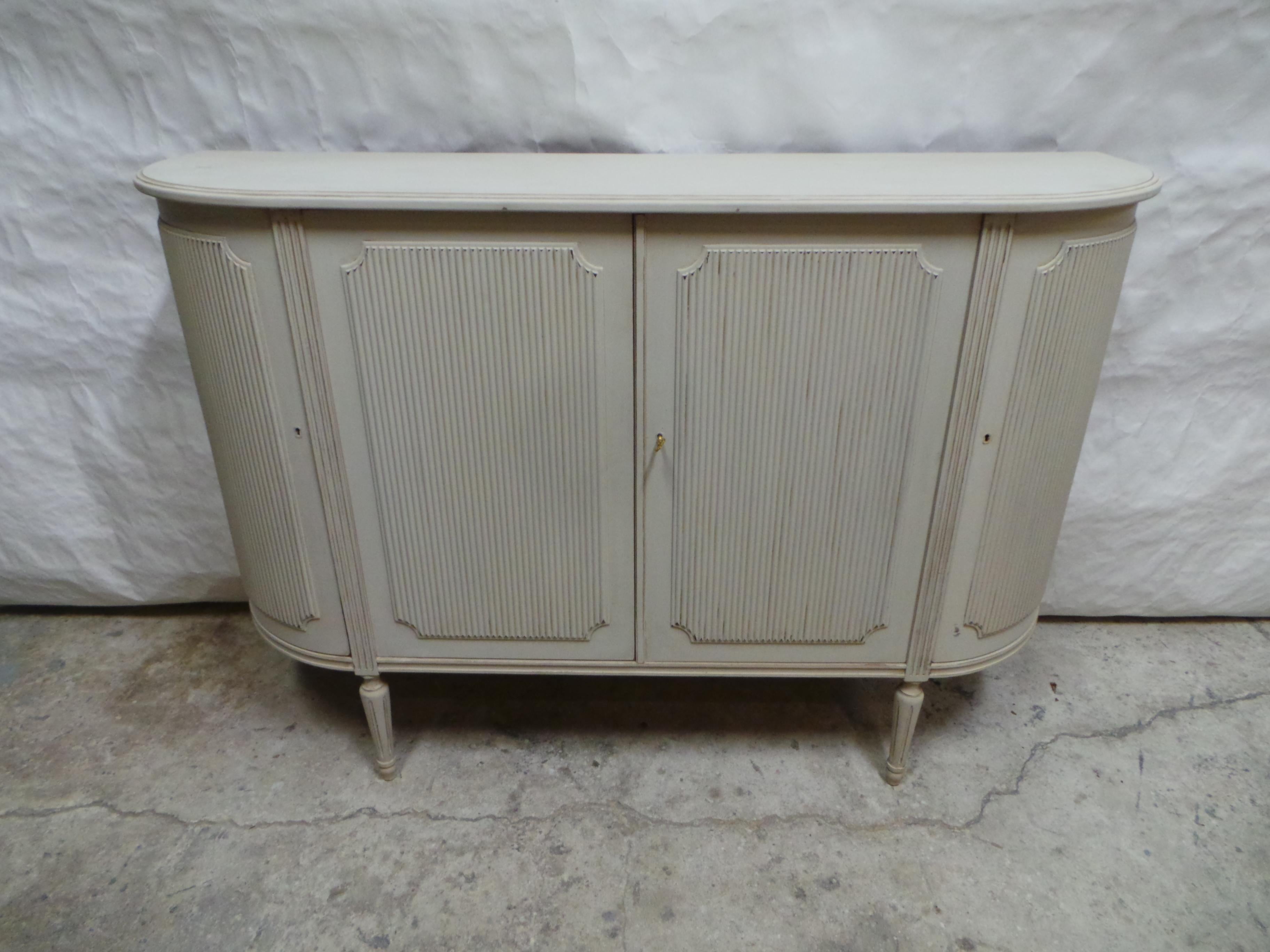 This is a unique Swedish Gustavian Style 4 Door Sideboard. its been restored and repainted with Milk Paints 