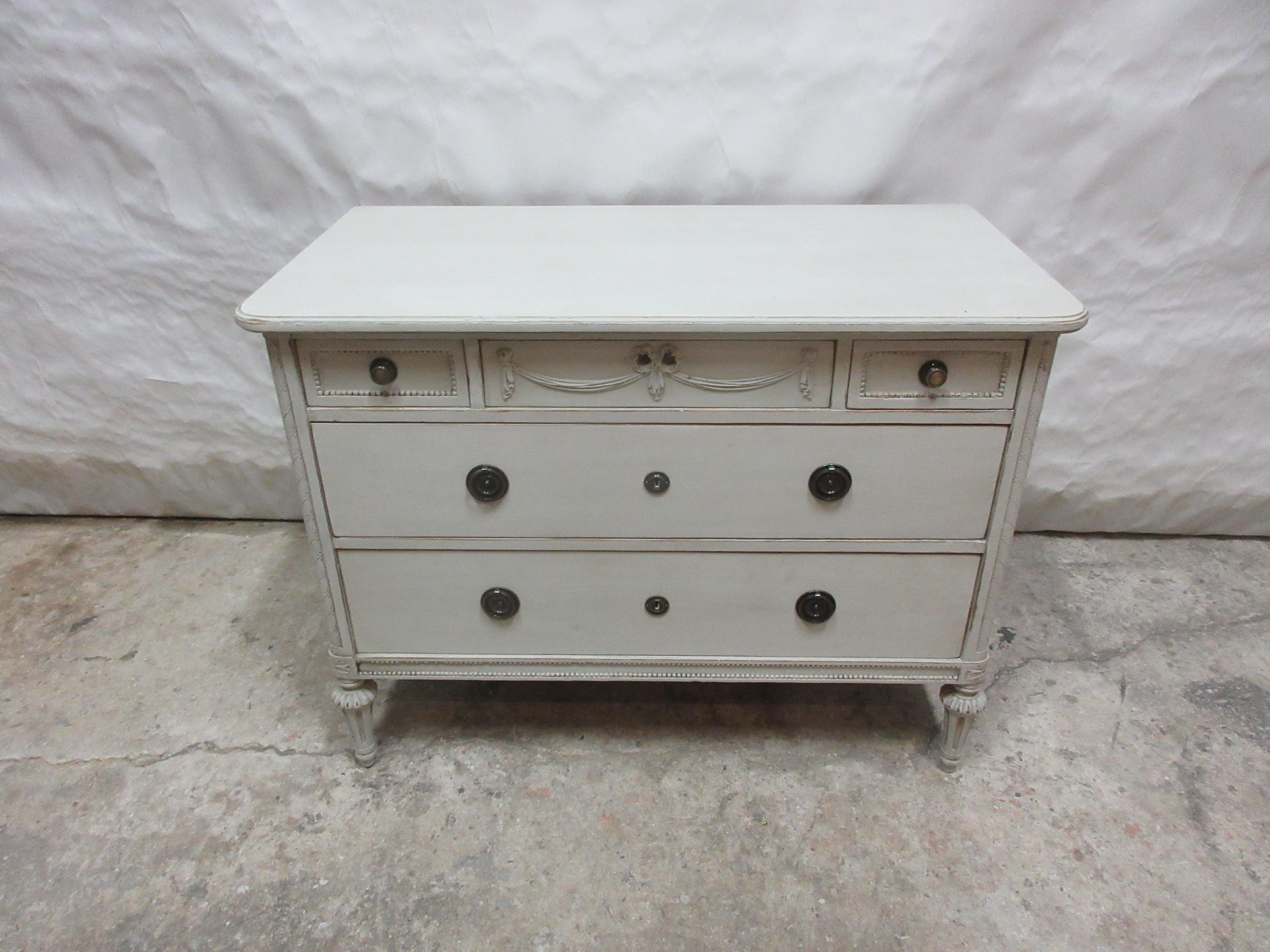This is a unique Swedish Gustavian Style 5 Drawer Chest. Its been restored and repainted with Milk Paints 