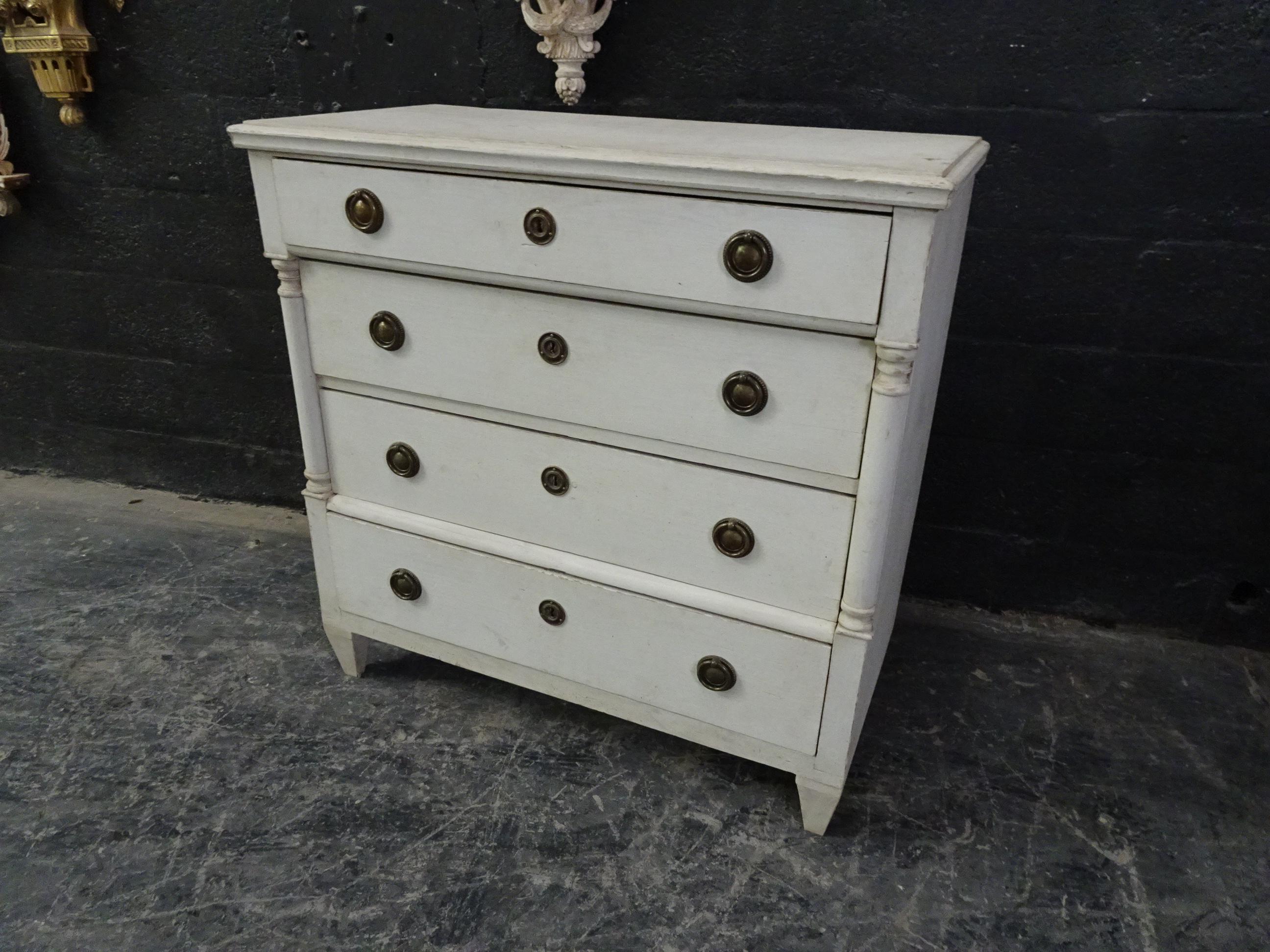 This is a Swedish Gustavian style chest, its been restored and repainted with milk paints 