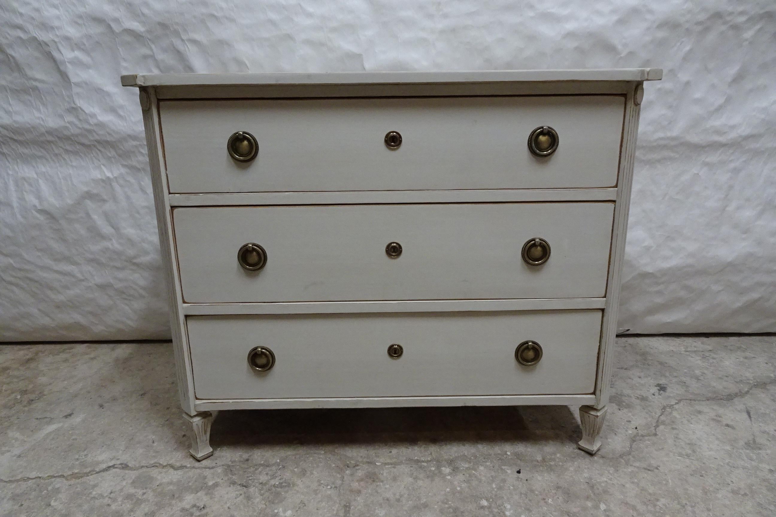This is a Swedish Gustavian Style Chest Of Drawers. its been restored and repainted with Milk paints 