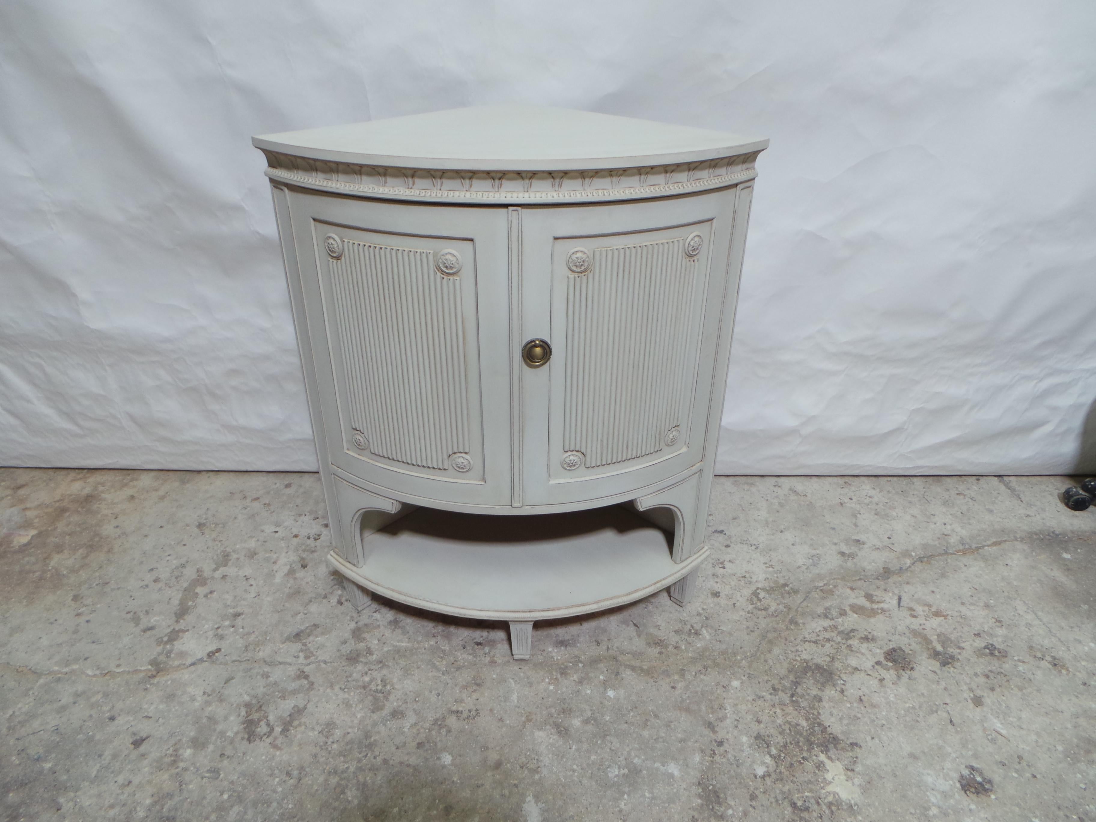 This is a unique Swedish Gustavian style corner cabinet.  it was just restored and repainted with Milk Paints 
