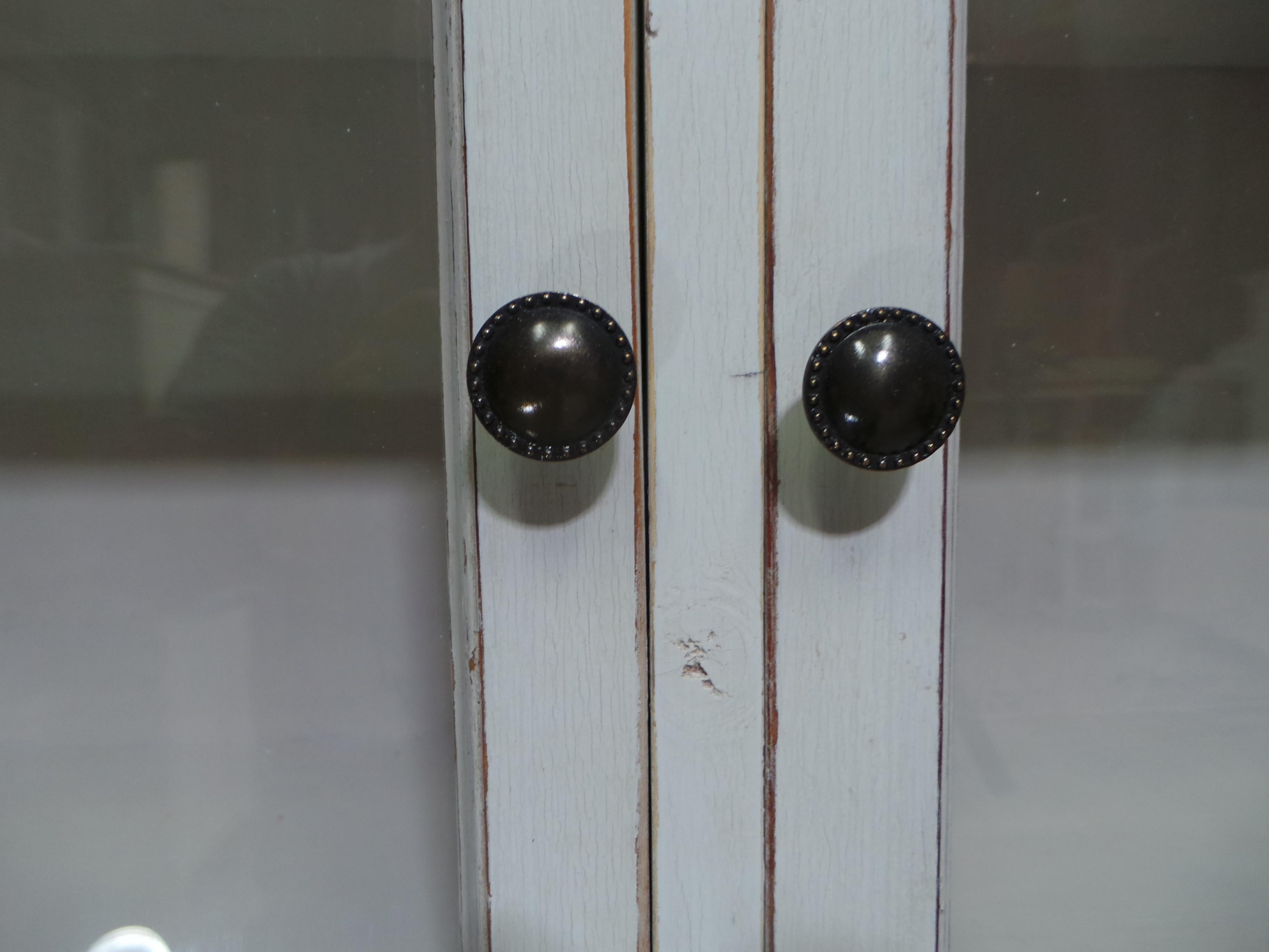 
This is a unique Swedish Gustavian Style Glass Top Cabinet. it was assembled with using a chest of drawers from 1990 and Antique Windows over 100 years old.  If you look at the pics you will see the old puddy holding the glass in the frames.