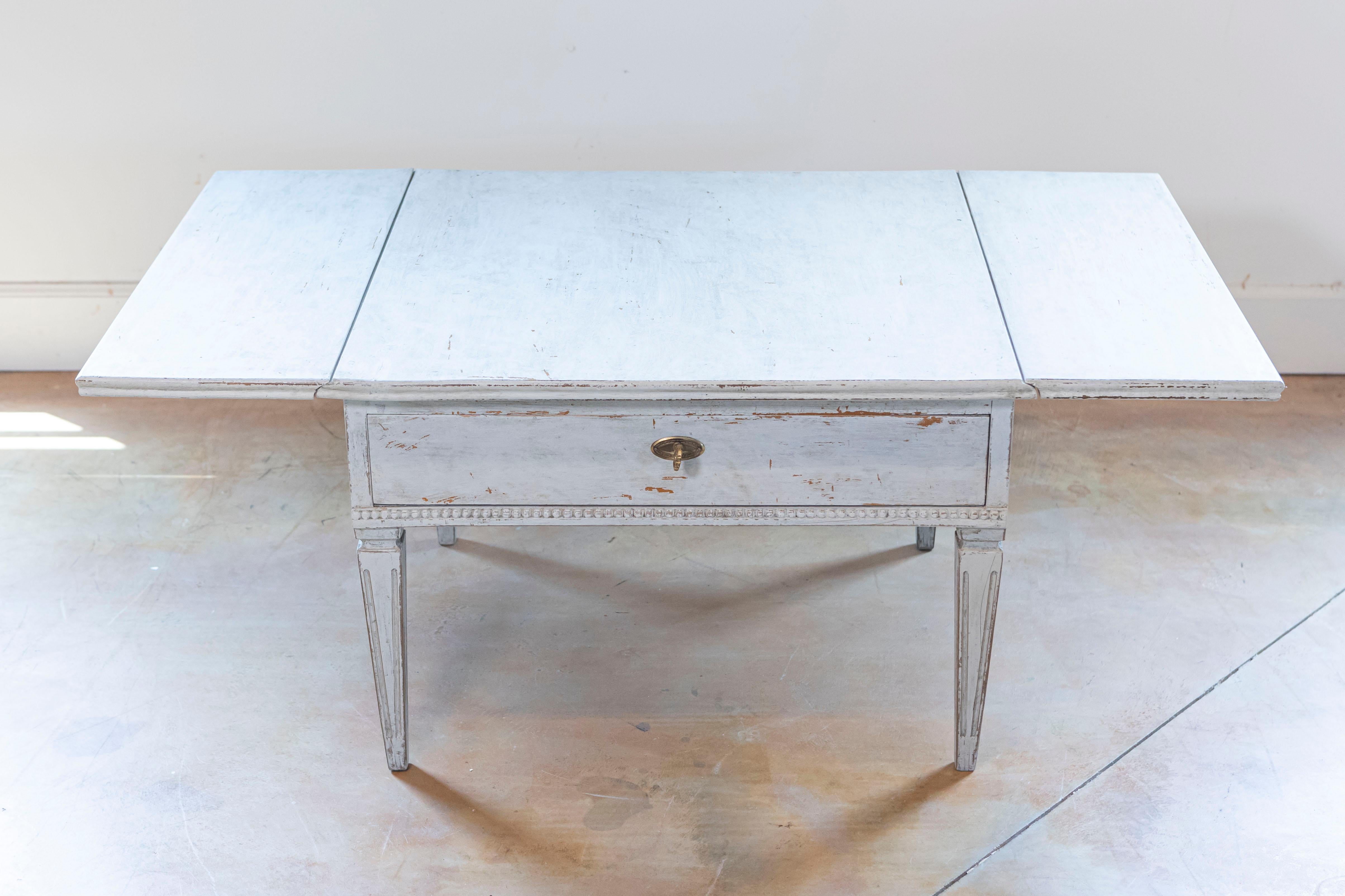 Carved Swedish Gustavian Style Painted Coffee Table with Drop Leaves, 20th Century For Sale