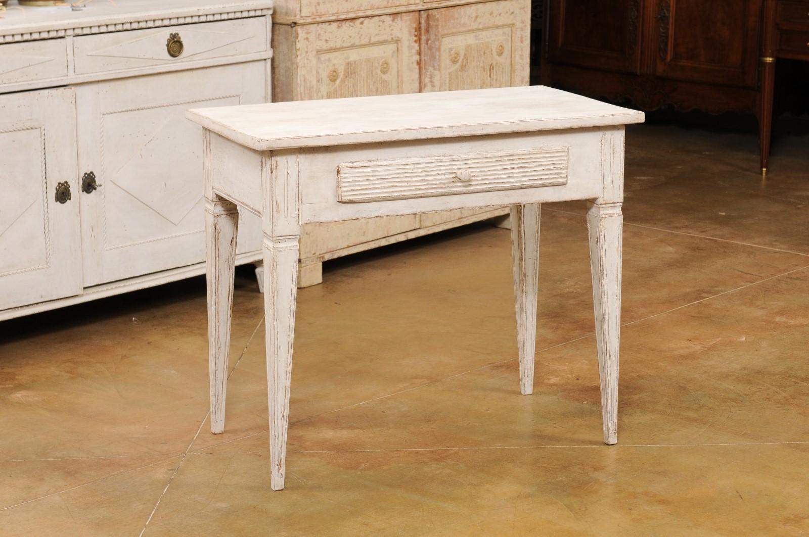 Carved Swedish Gustavian Style Painted Side Table with Reeded Drawer and Tapered Legs For Sale