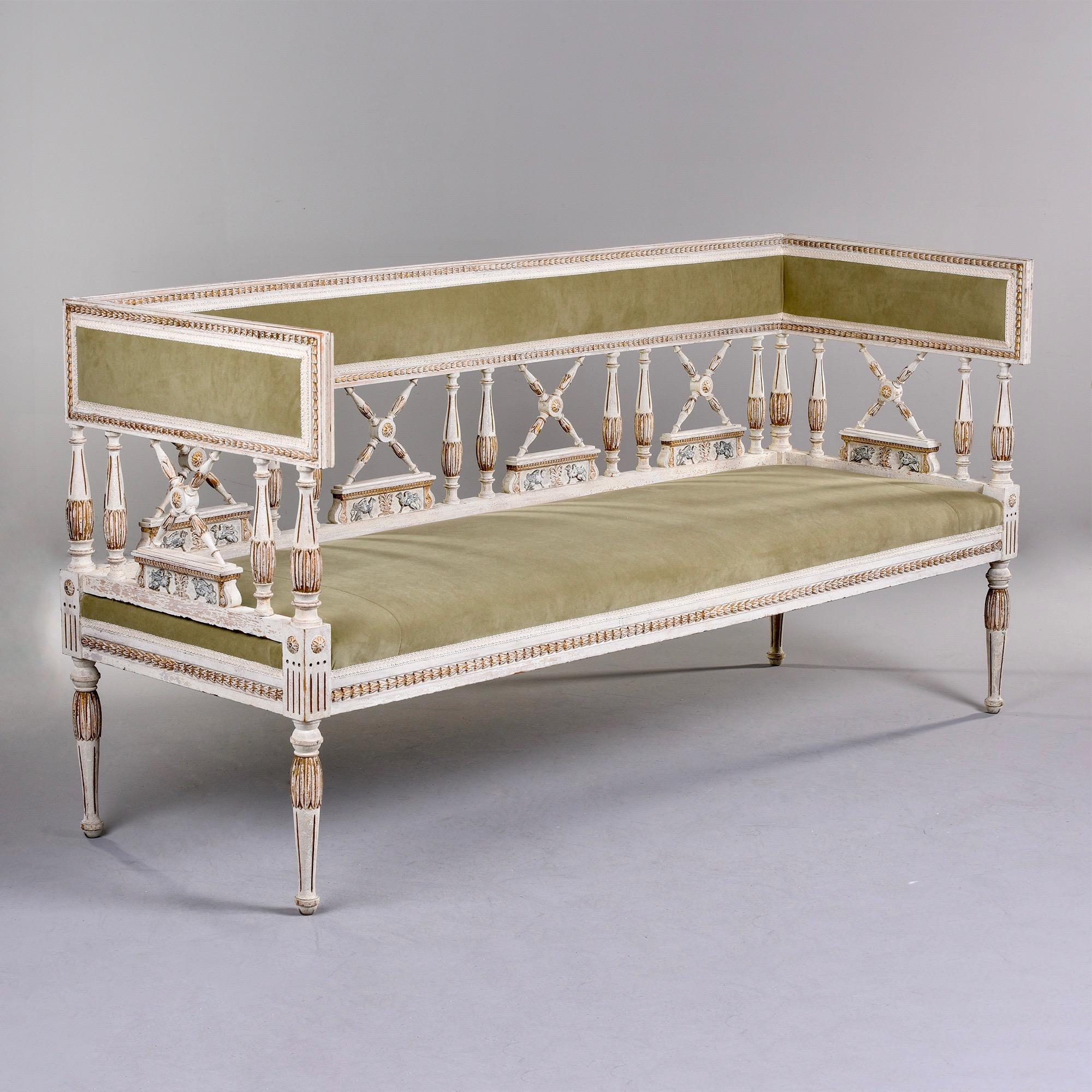 Circa 1900 Swedish sofa in traditional style with carved a gilded details. New upholstery in sage colored short-nap commercial velvet. Very good vintage condition. Coordinating set of chairs listed under separate listing. 

Overall measurements