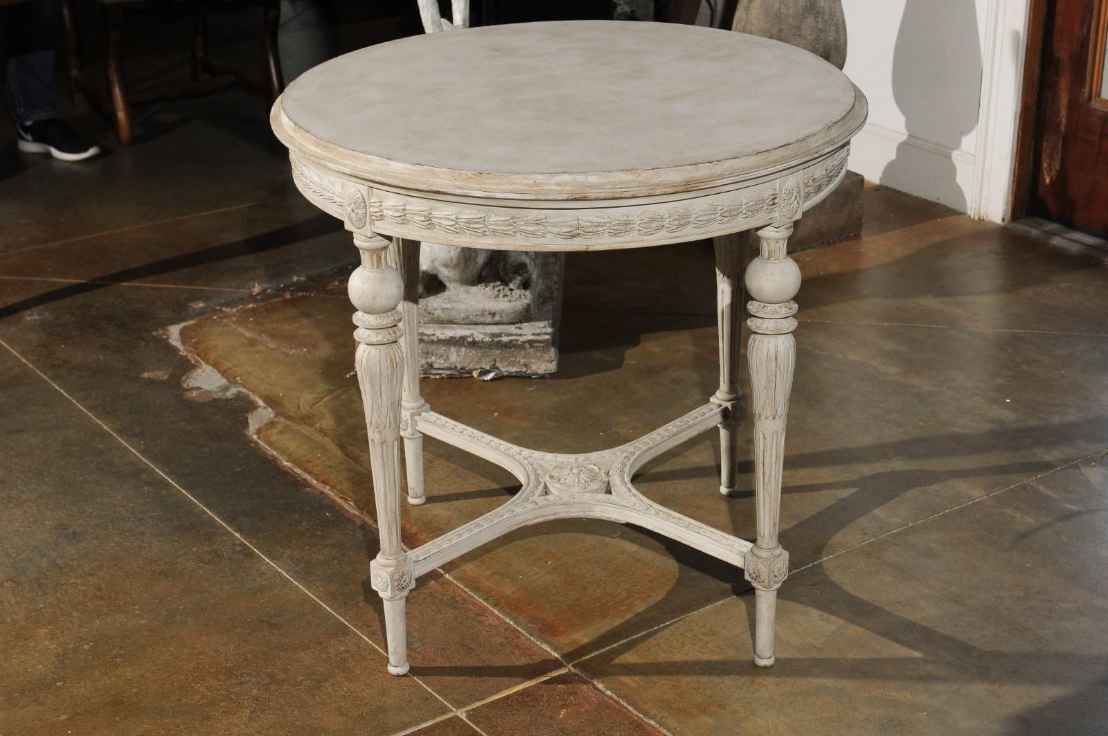 Swedish Gustavian Style Painted Wood Round Table with Carved Apron and Legs 6