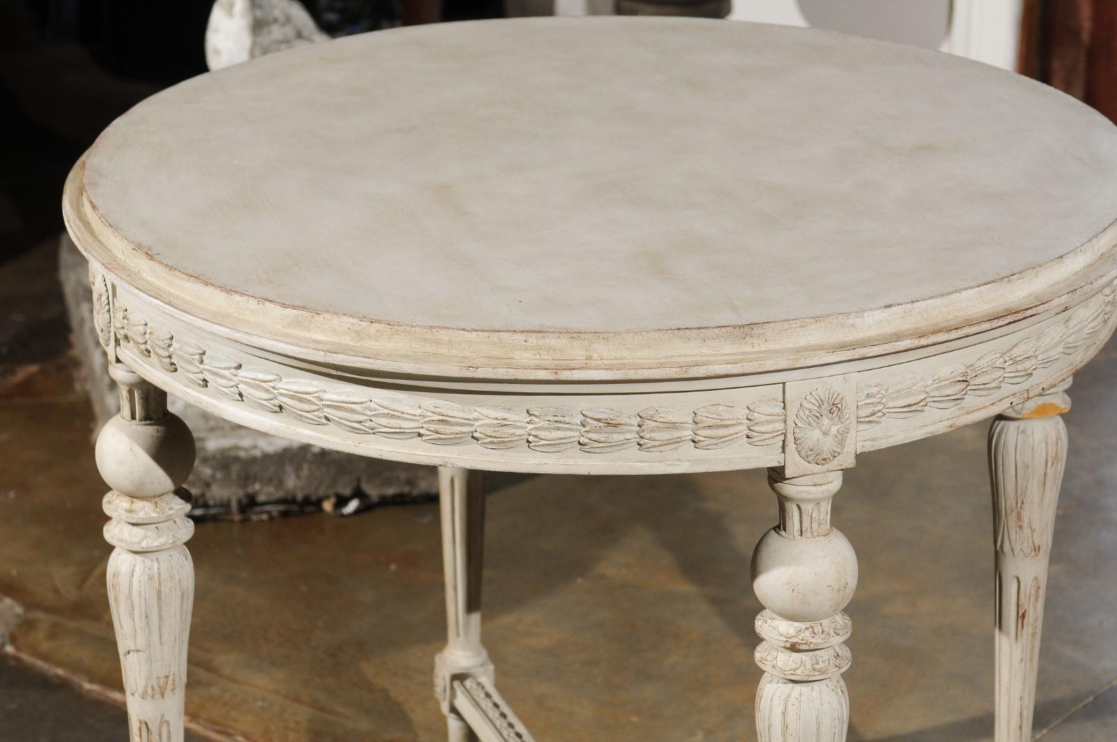 Swedish Gustavian Style Painted Wood Round Table with Carved Apron and Legs 5