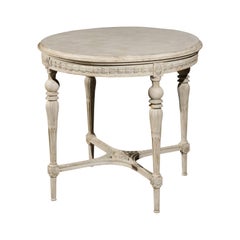 Swedish Gustavian Style Painted Wood Round Table with Carved Apron and Legs