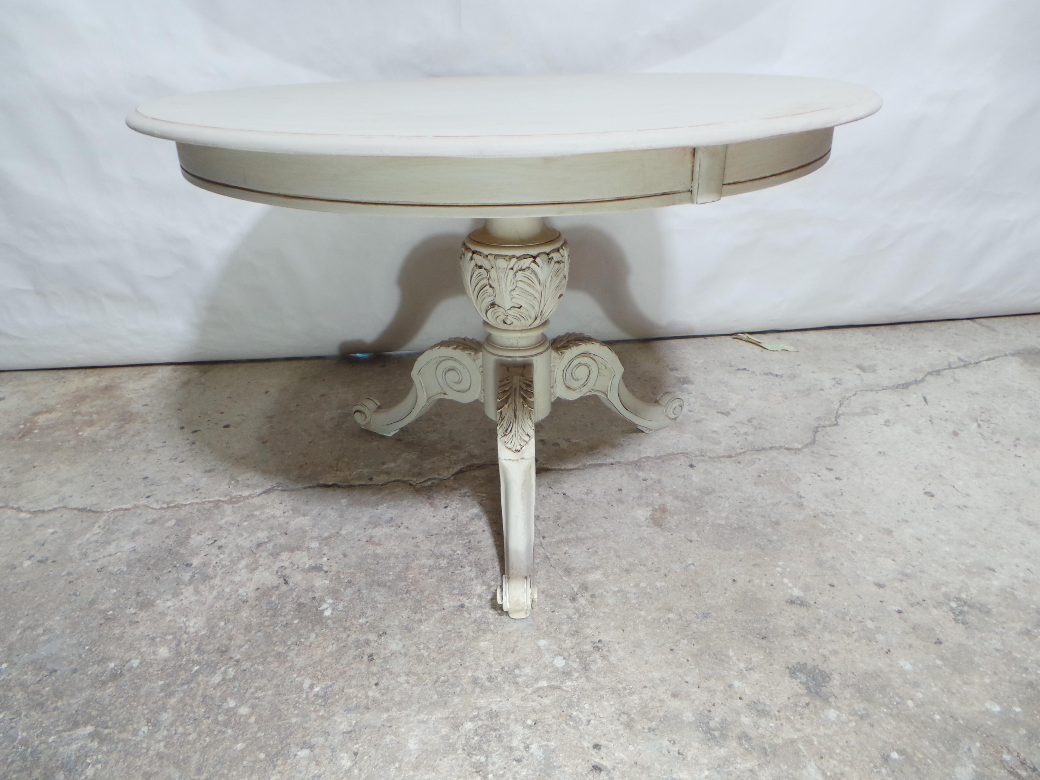 This is a unique Swedish Gustavian Style pedestal table. it has been restored and repainted with Milk paints 