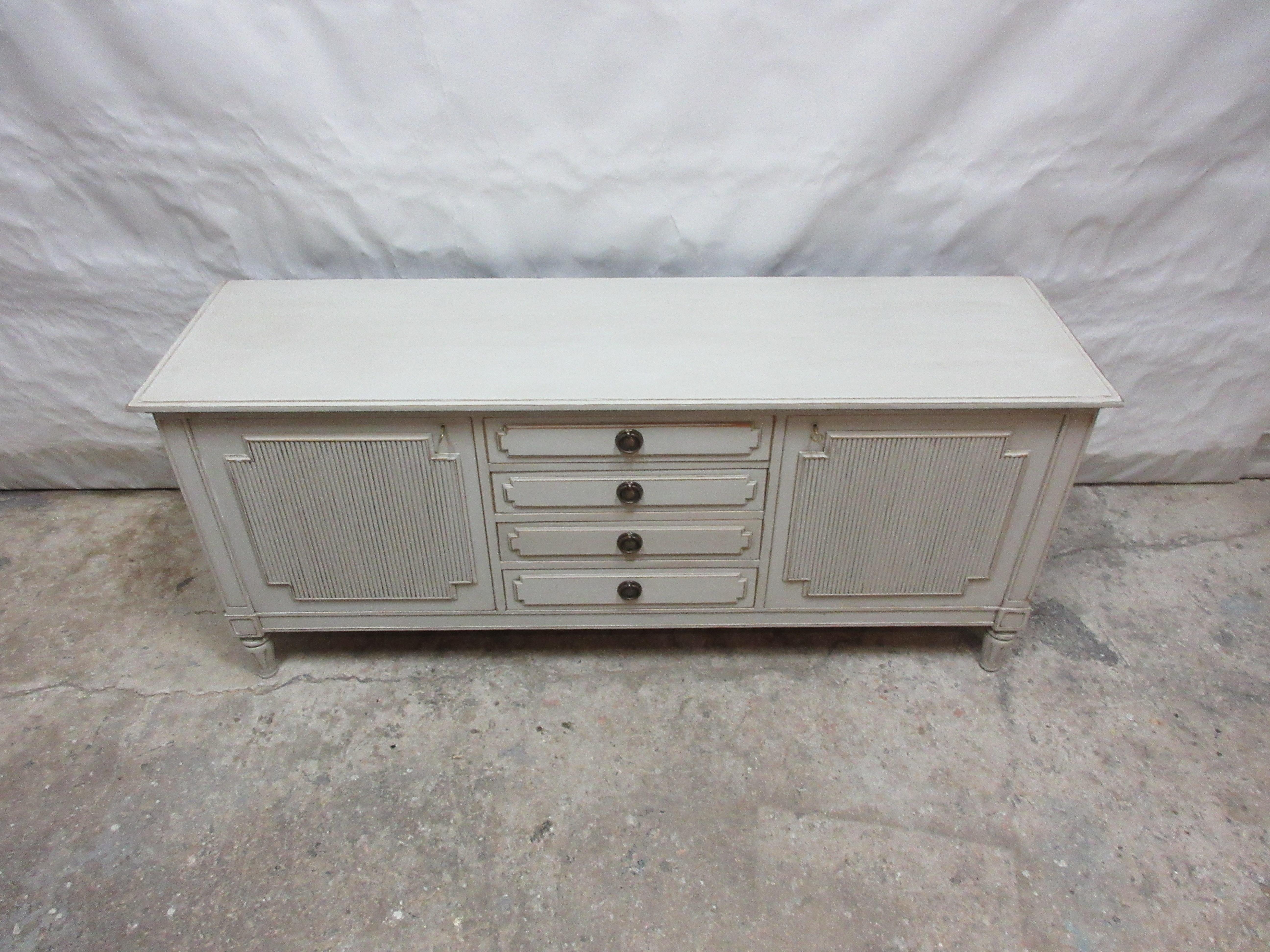 This is a Swedish Gustavian Style Sideboard, its been restored and repainted with Milk Paints 