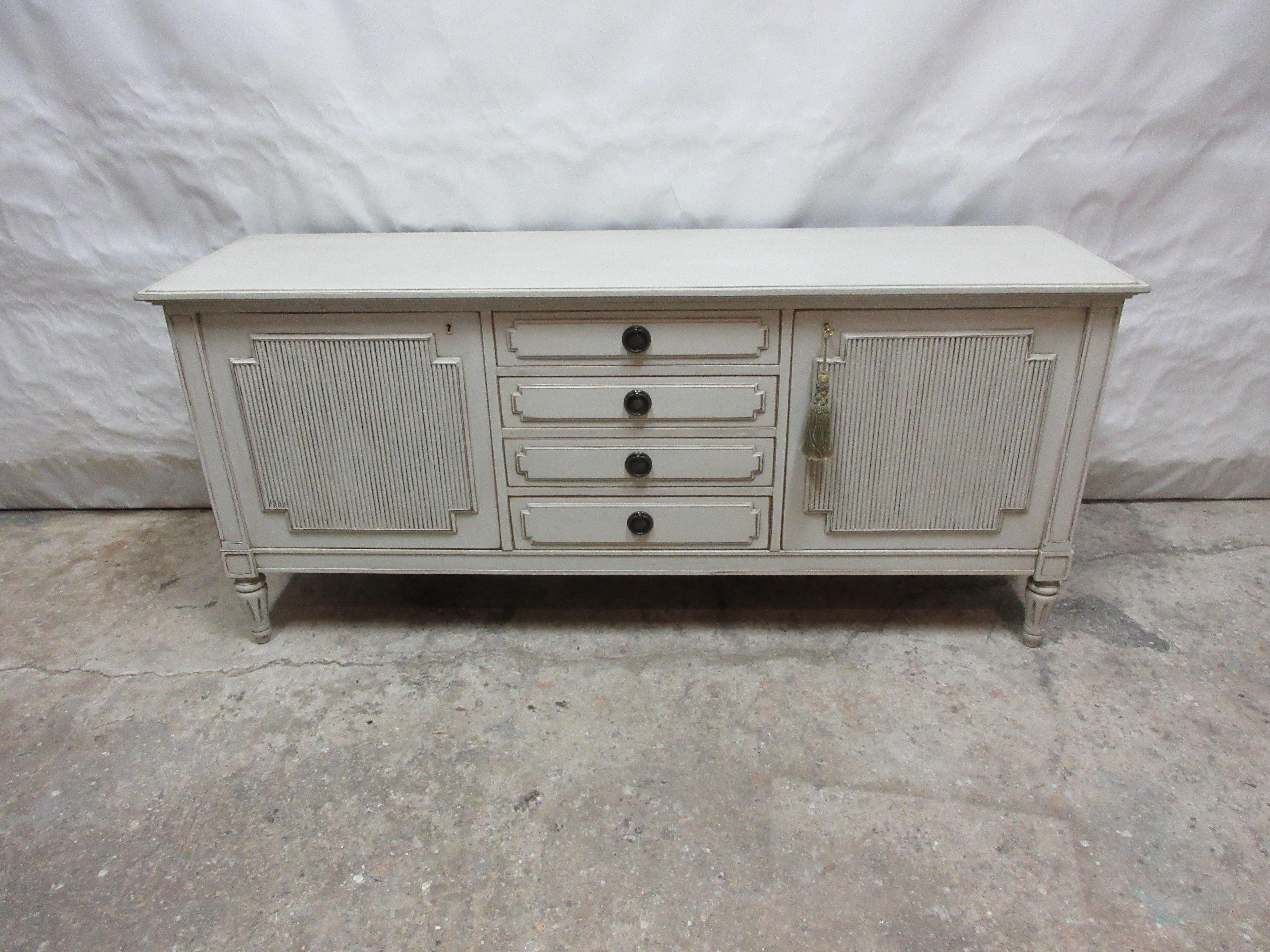 This is a Unique Swedish Gustavian Style Sideboard. Its been restored and repainted with Milk Paint 