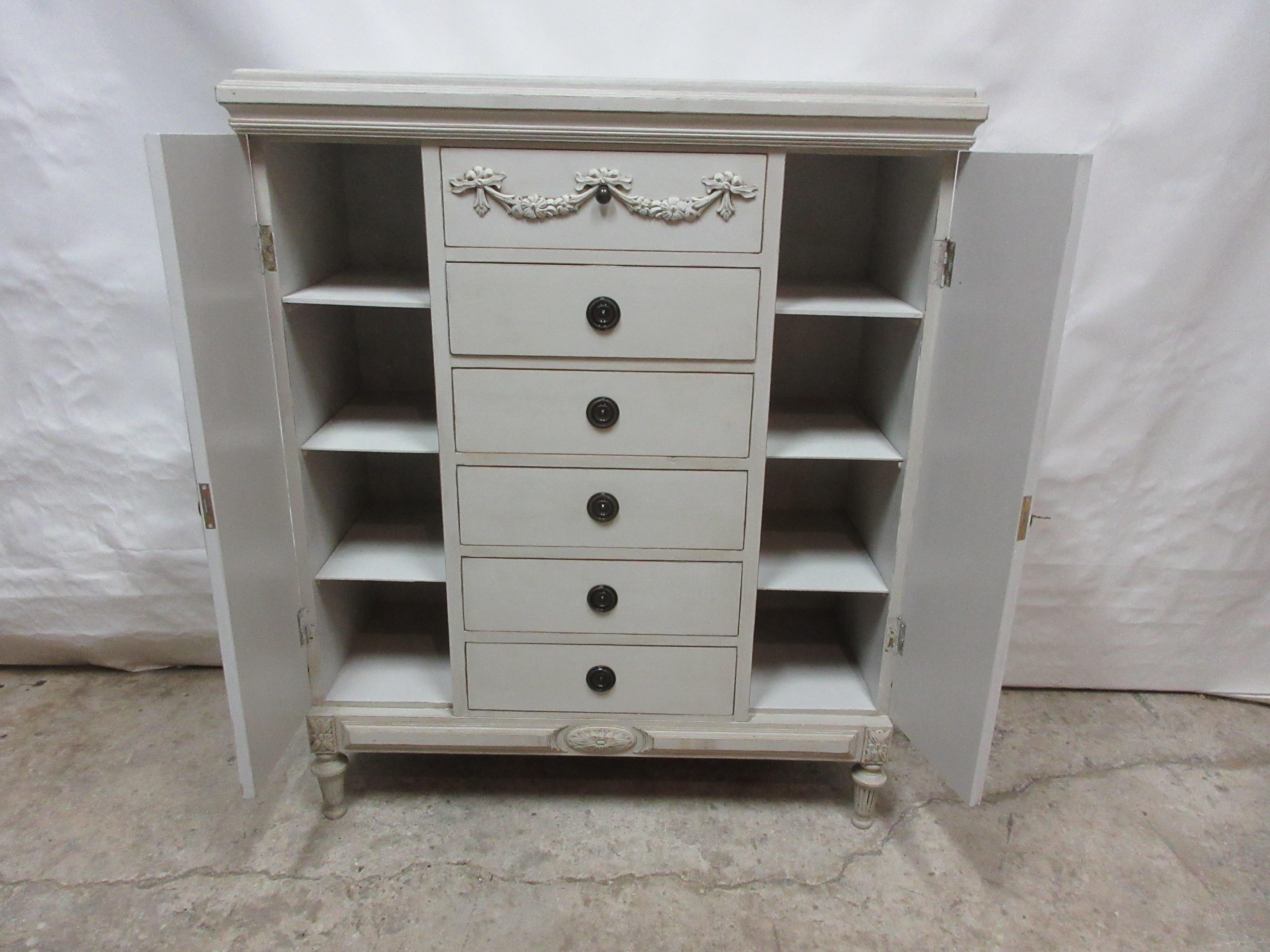 This Swedish Gustavian tall chest cabinet was found at an Estate auction in Stockholm Sweden. Its been restored and =repainted with Milk Paints 