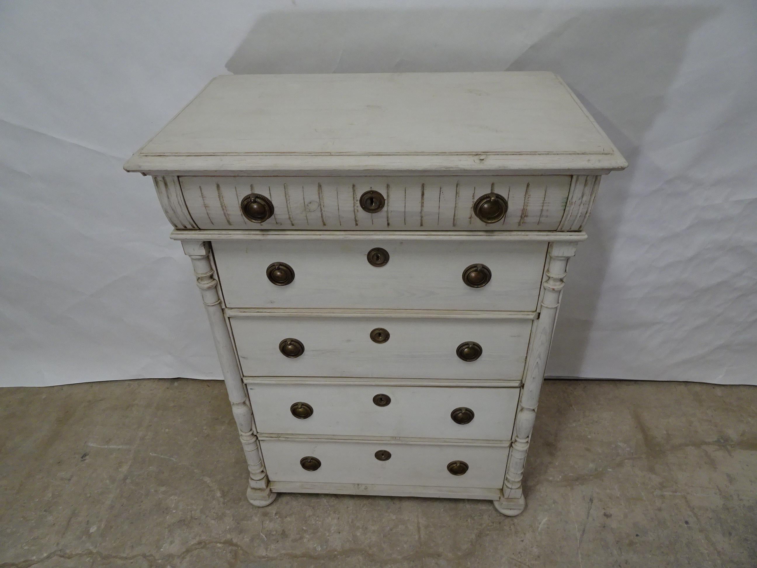 This is a Swedish Gustavian tall chest, its been restored and repainted with milk paints 