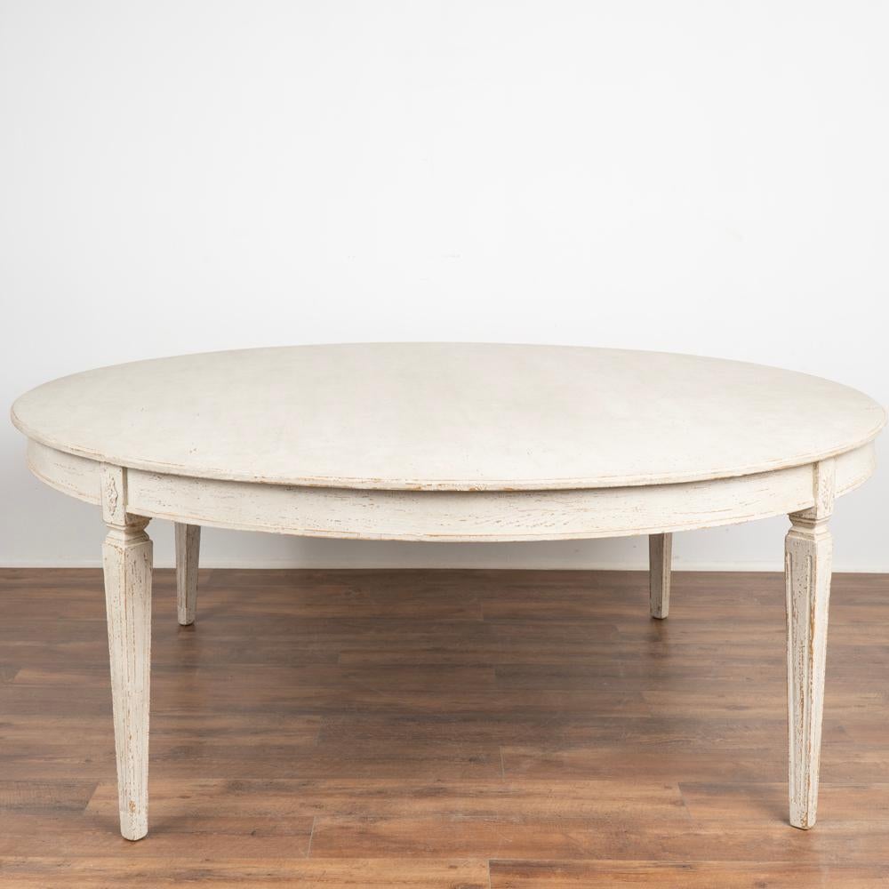 Round dining table, 6.5' diameter with the look of the gustavian style.
This size table did not exist in the gustavian period; this new table mirrors the Swedish style in a larger size for today's modern home.
Lovely tapered fluted