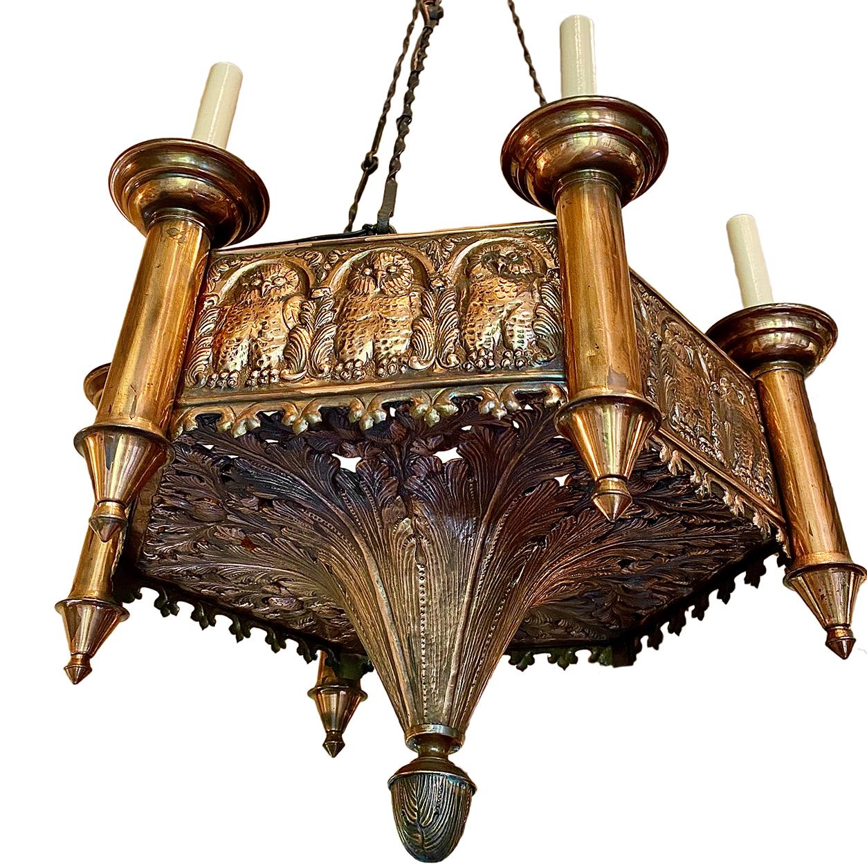 A circa 1900 Swedish copper six-light chandelier with owl motif on the body.

Measurements:
Diameter: 24.5