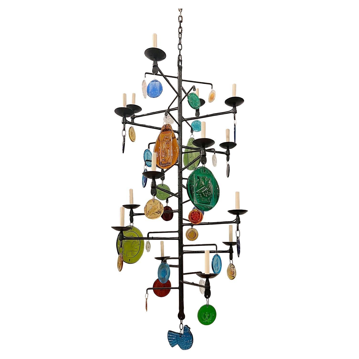 A Swedish circa 1970's large iron chandelier with glass pendants and 16 candelabra lights.

Measurements:
Minimum Drop: 78