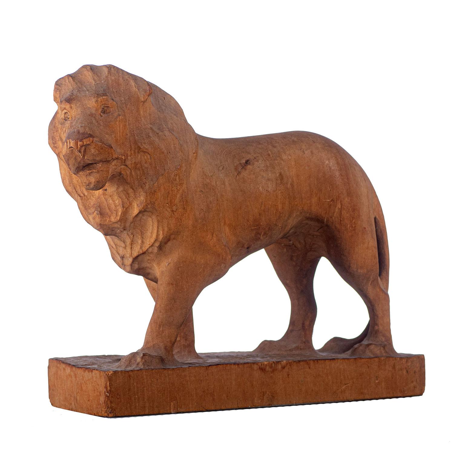 A rare hand carved sculpture of a lion in birch. Made in Berglinds toy factory in Nyköping, Sweden, early 1900s. The factory's main design idea was that the toys both should be tough enough to endure children’s play and also to serve as a decorative