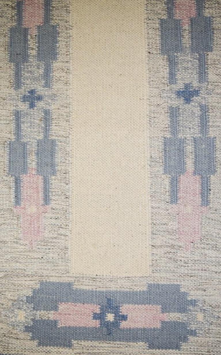 Swedish handwoven wool rug with fringes in the 