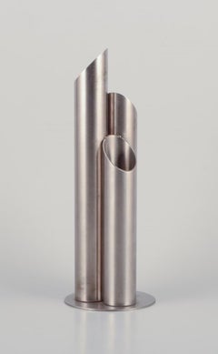 Swedish industrial designer. Stainless steel vase with three tubes. Ca 1970