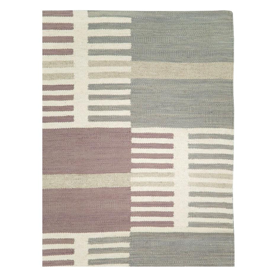 A contemporary Turkish flatweave Kilim accent rug handmade during the 21st century inspired by Swedish Kilim carpets from the mid-20th century period.

Measures: 6' 3