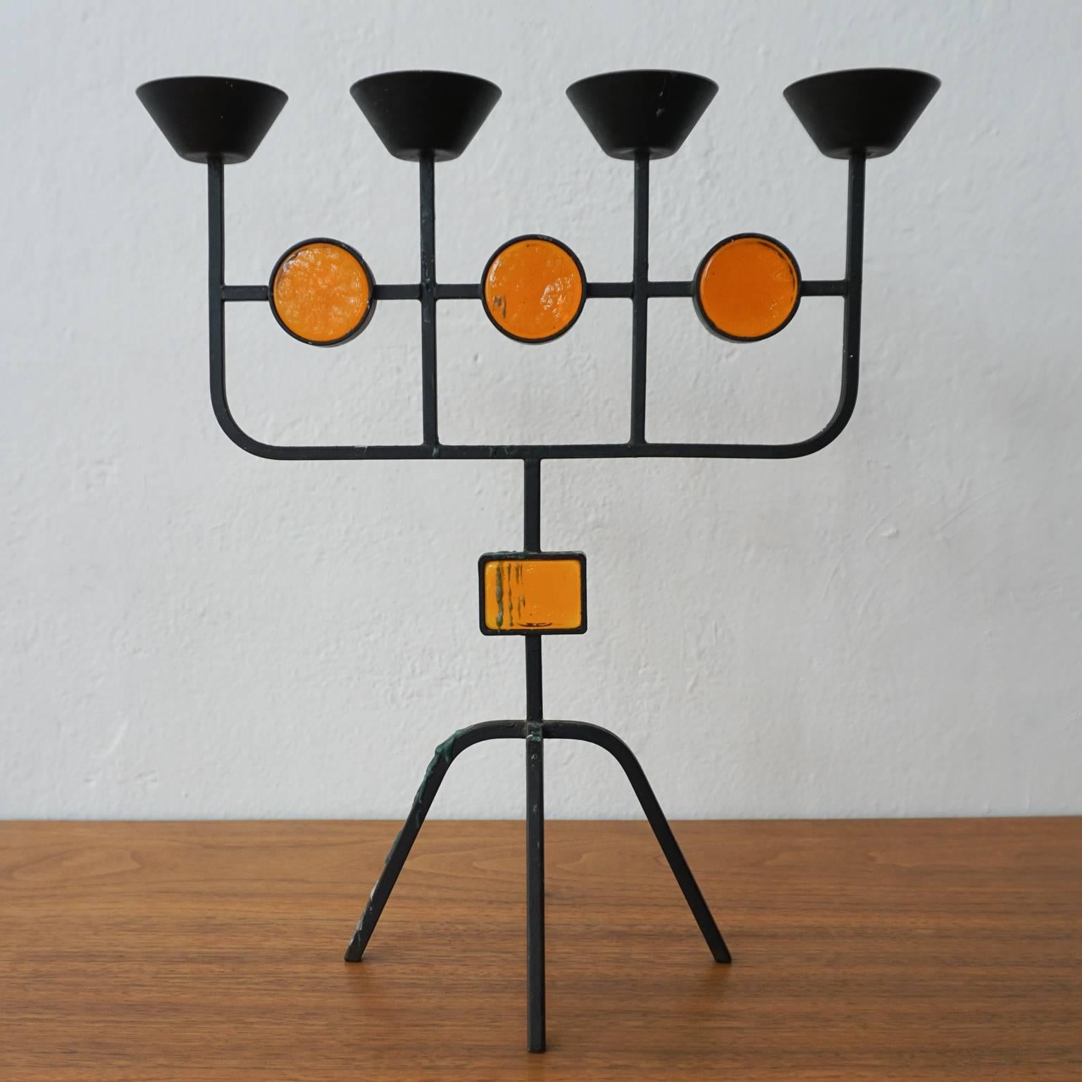 Iron and glass candleholder from Sweden.