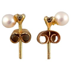 Swedish Jeweler, a Pair of Classic Ear Studs in 18-Carat Gold