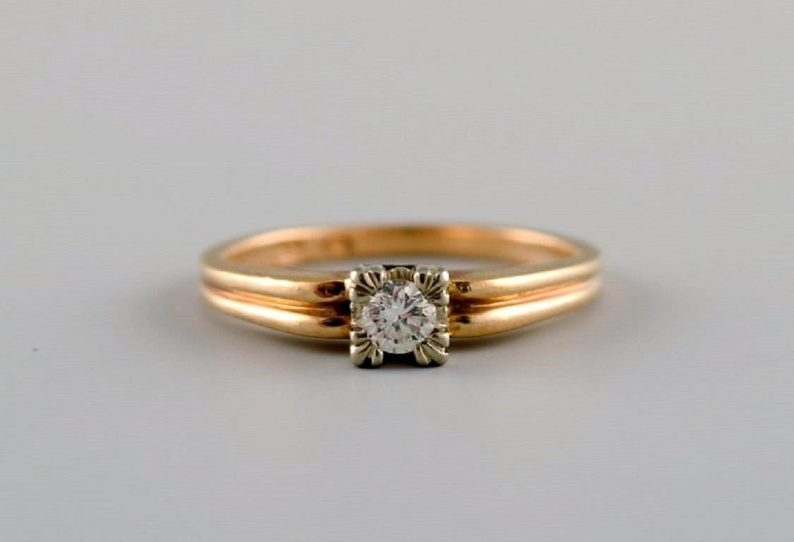 Brilliant Cut Swedish Jeweler, Vintage Ring in 18 Carat Gold Adorned with 0.14 Carat Brilliant For Sale
