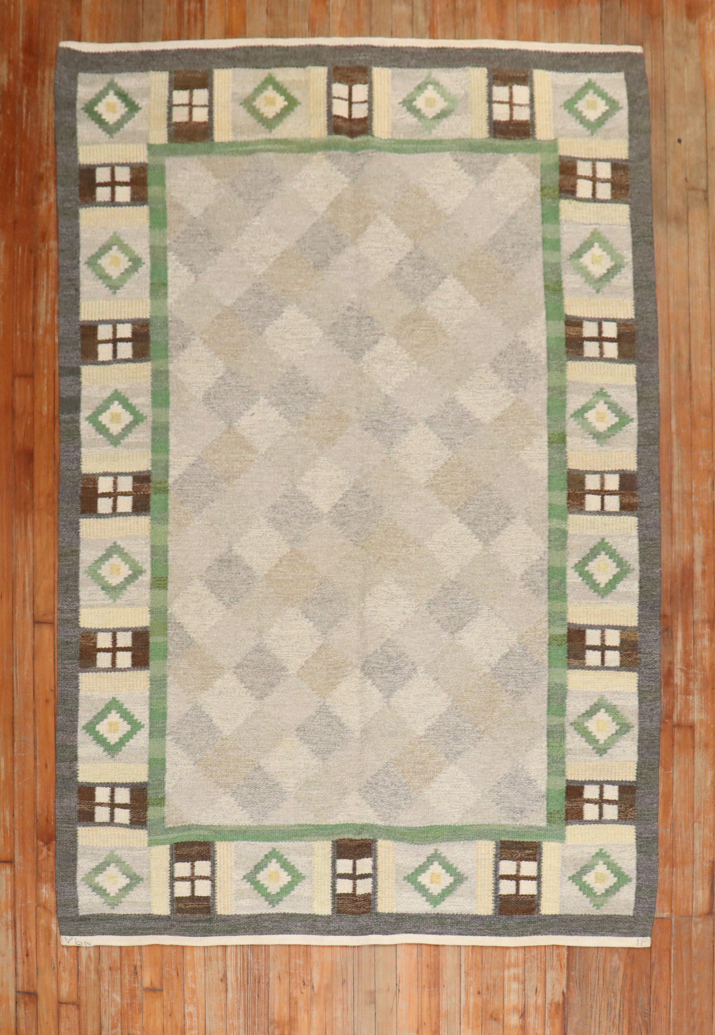 Swedish flatweave carpet from the middle of the 20th century.

Measures: 5'4'' x 8'.