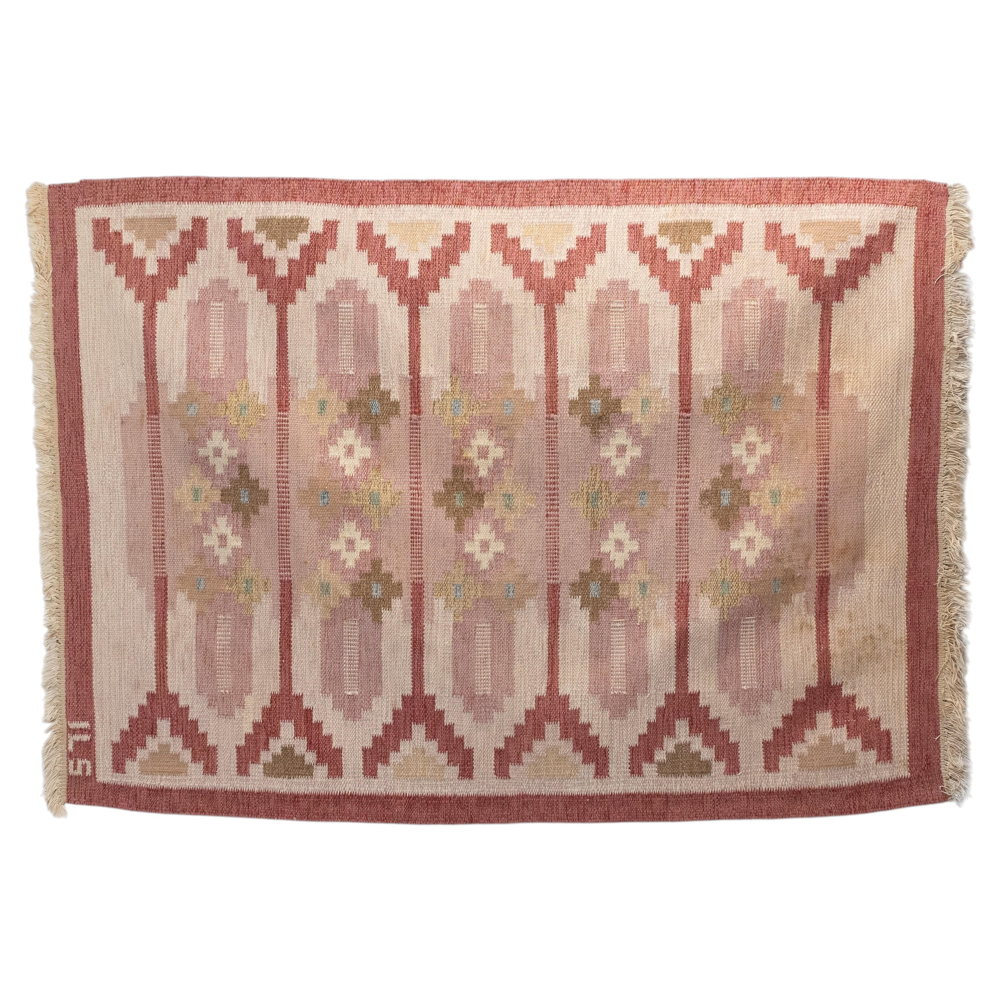 Kilim svedese nei toni del rosso