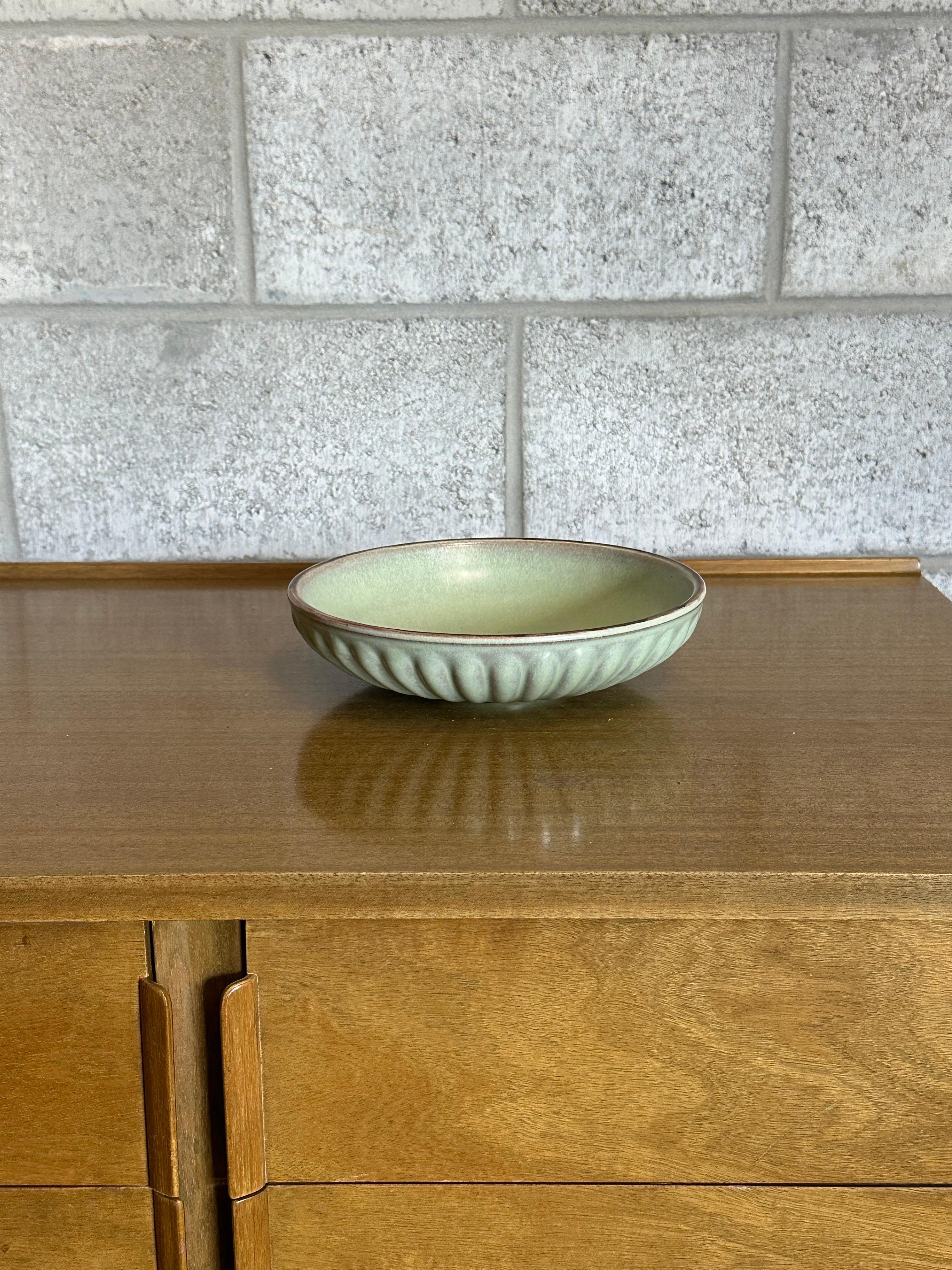 A large decorative bowl attributed to Harald Östergren for Upsala Ekeby. Very nice size at 9