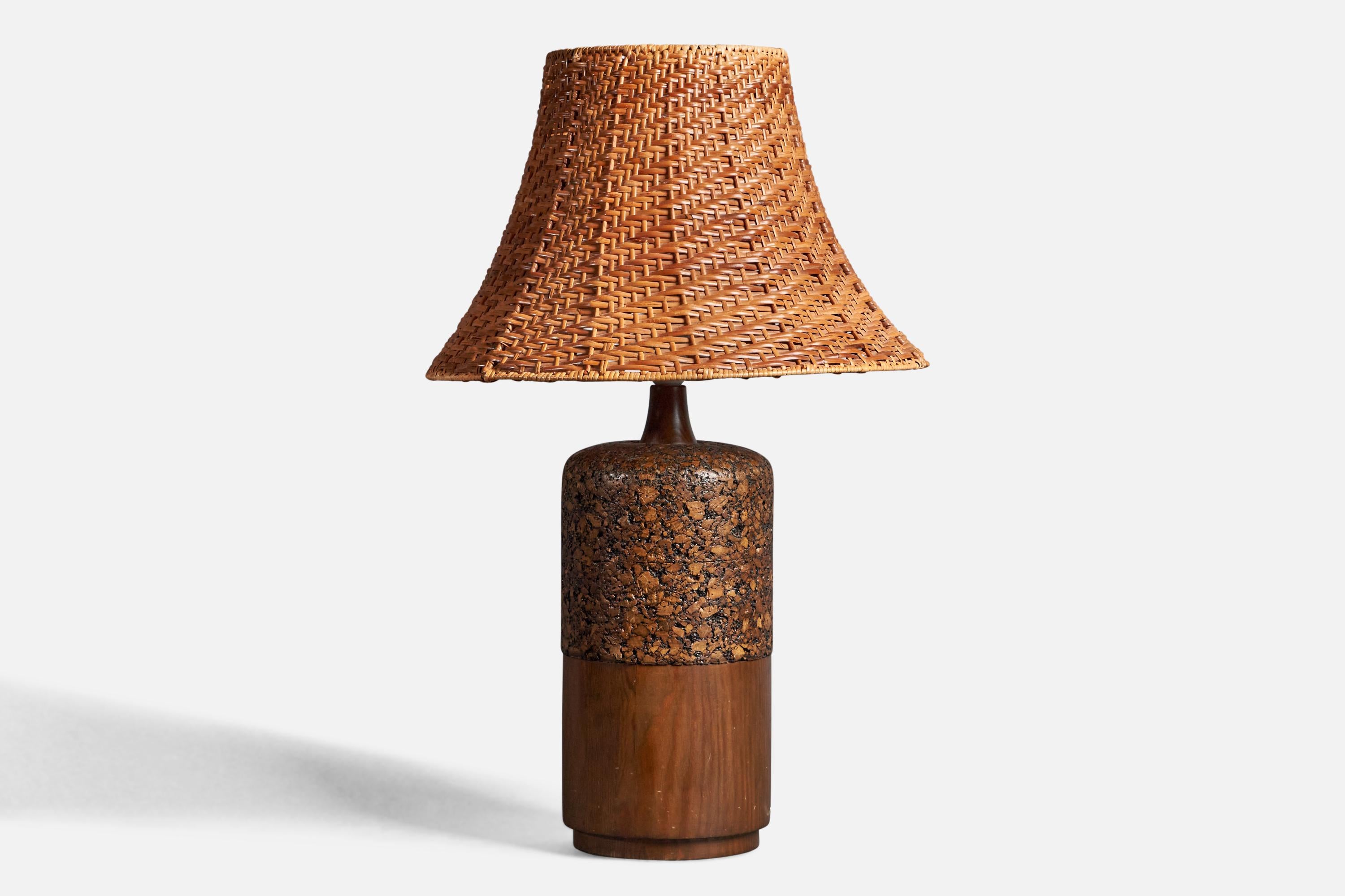 A very large table lamp designed and produced in Sweden, 1950s. In solid stained pine. Stained cork.

Stated dimensions exclude lampshade, height includes socket. Sold without lampshade.