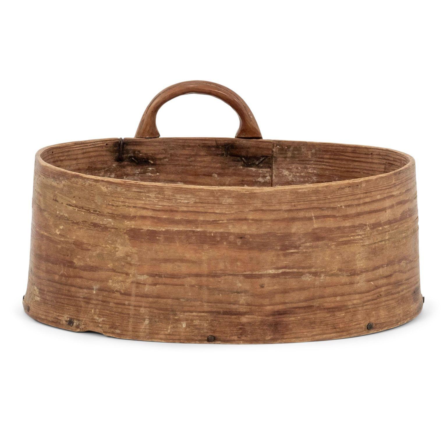 Swedish light color pine and bentwood box with handle. Originally used in the late 19th century as a grain scoop.

Note: Original/early finish on antique and vintage metal will include some, or all, of the following: patina, scaling, light rust,
