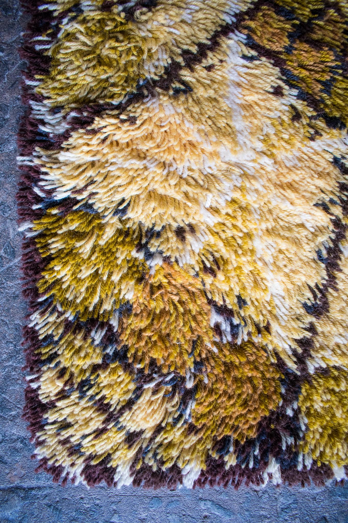 A warm-tone Rya rug by Swedish designer Marianne Richter in her 